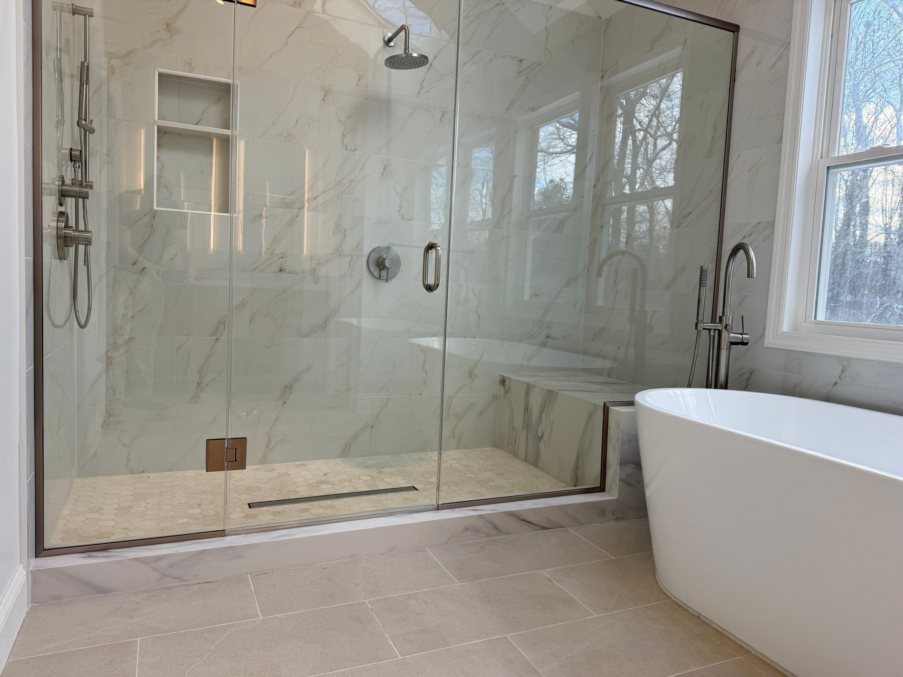 Bathroom Remodel using Tile by Home Concepts Construction