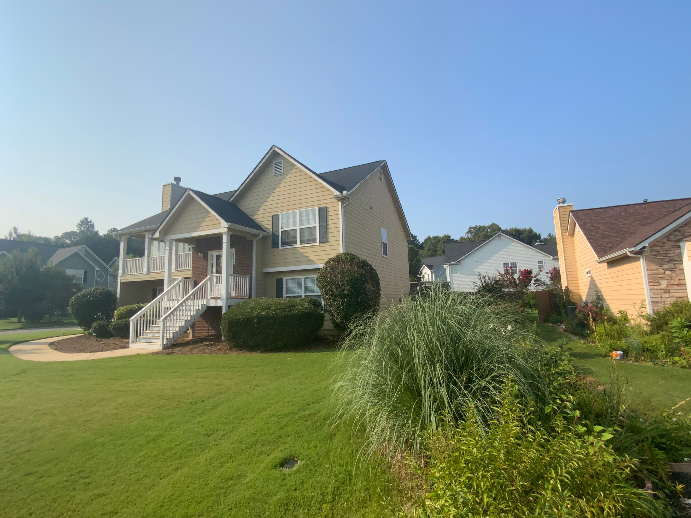 Comprehensive Exterior Painting for Cartersville Home with Blue Siding Transformation by Swift Home Renovations