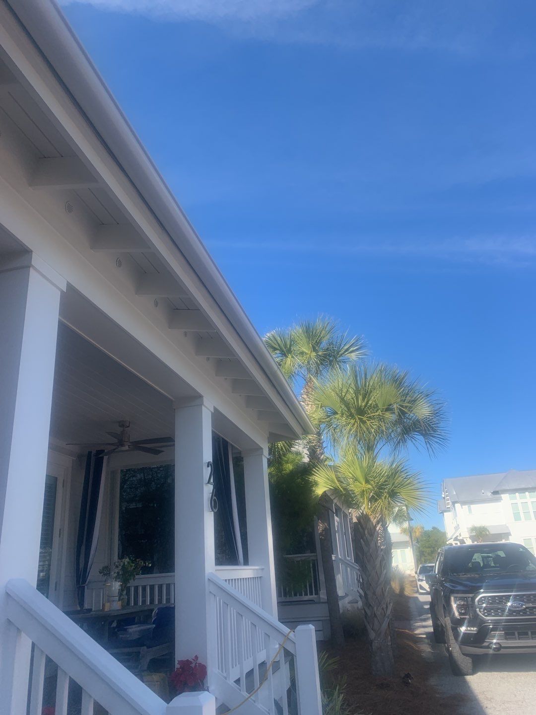 White Half-Round Gutters Installation in Rosemary Beach, FL by Gutter Professors