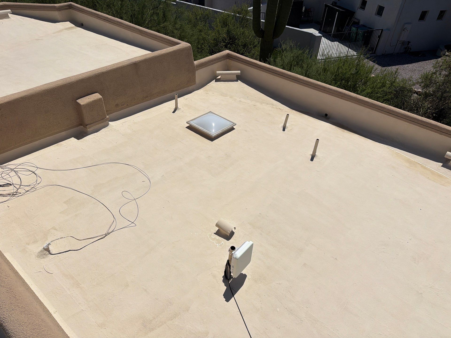 Residential Flat Roof Elastomeric Coating and Restoration in Tucson by West Coast Roofing AZ