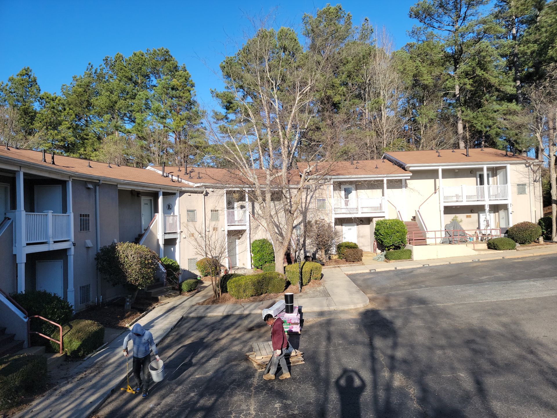 Commercial Roofing Installation using Owens Corning Autumn Brown by Inspector Roofing and Restoration