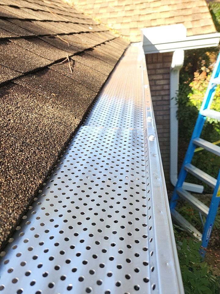 Seamless Gutter Installation using K-Style Seamless Gutters and LeafBlaster Pro Gutter Guards by Gutter Professors