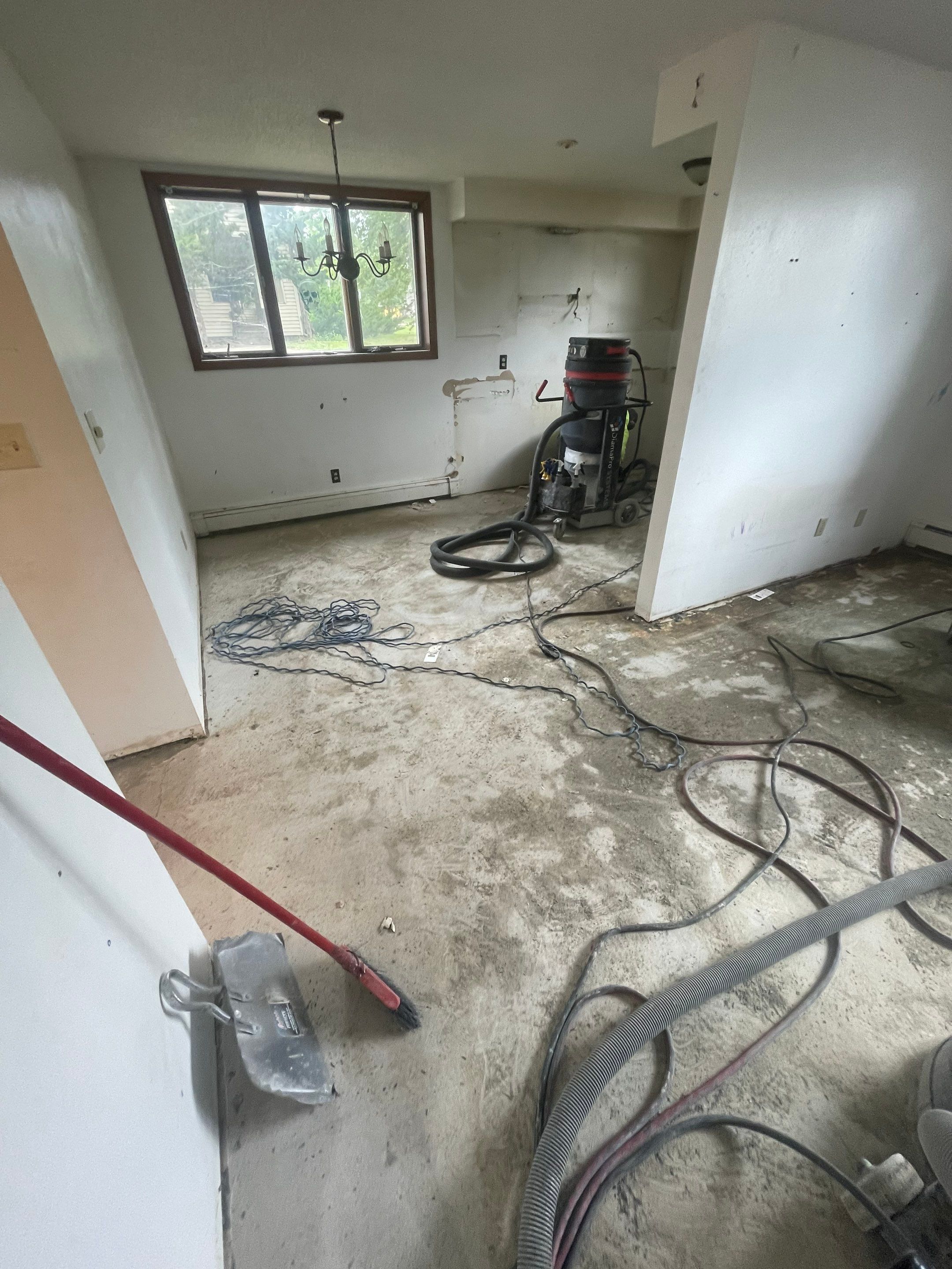 Commercial Subfloor Preparation and Flooring Restoration in Sioux Falls by Select Painting, Coatings & Garage Cabinets