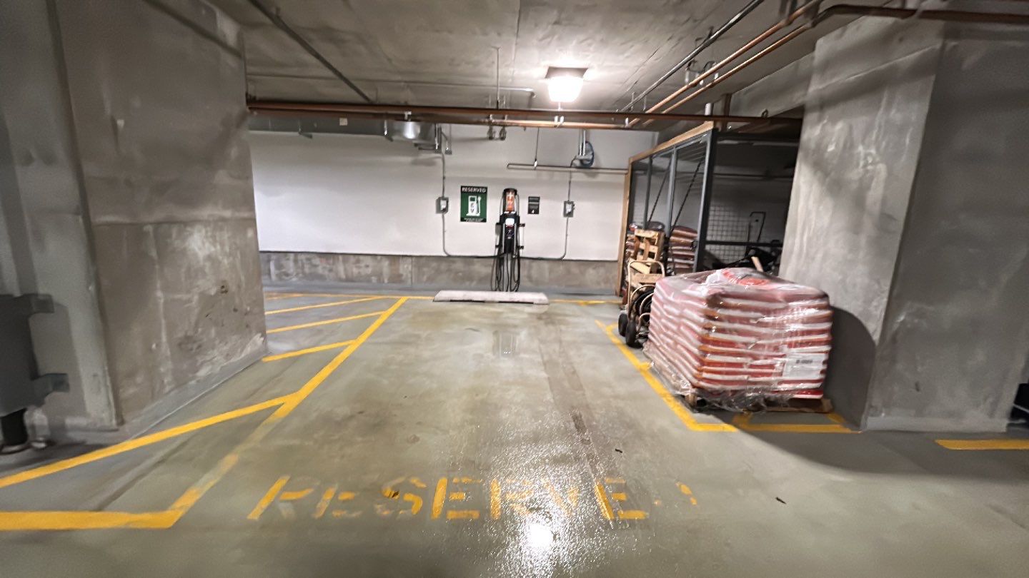 Parking garage using Hot water by Northern Power Washing LLC.