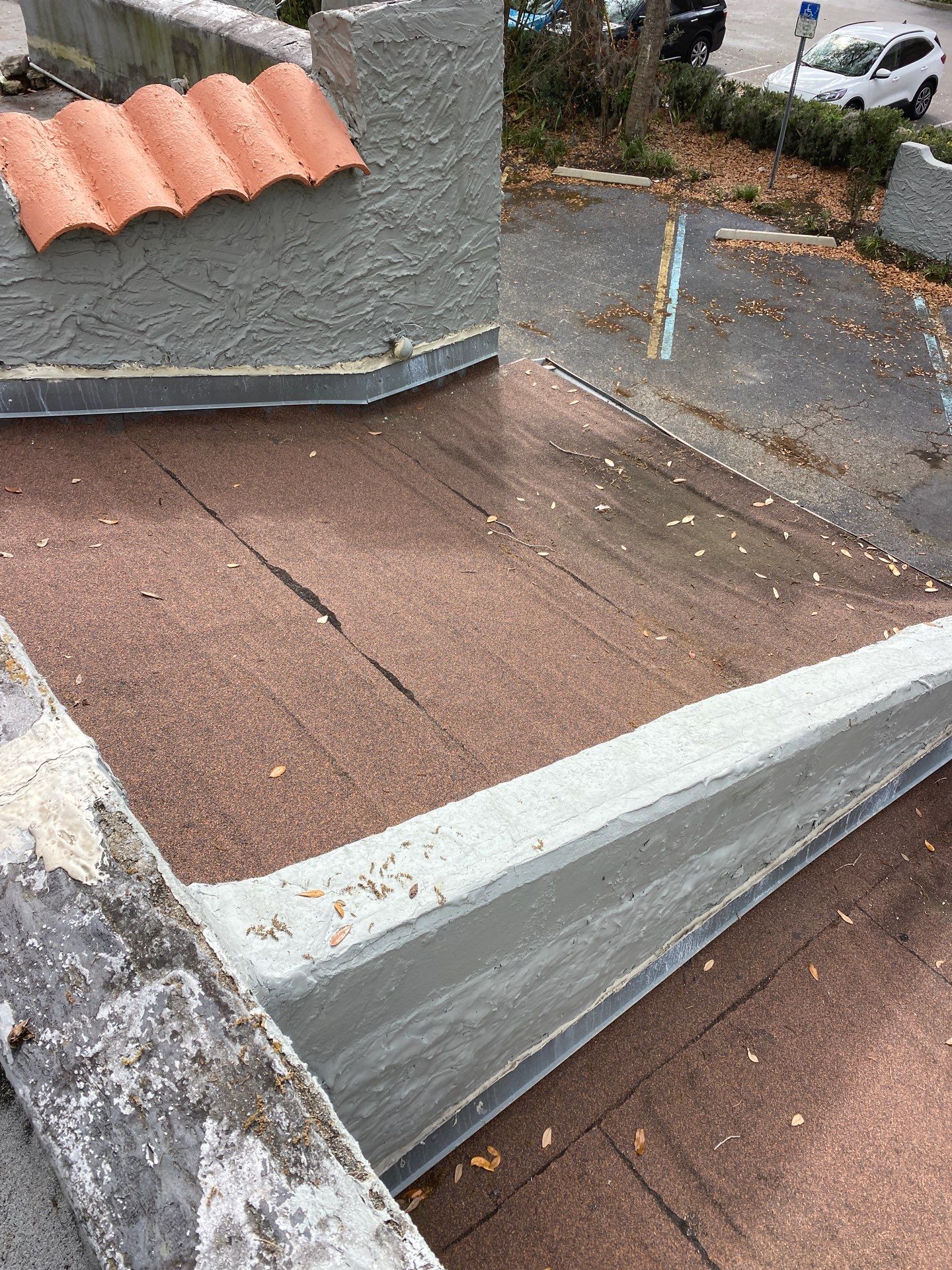 Commercial Flat Roof Maintenance and Drainage Repair in Orlando by Tip Top Roofing Co., Inc.