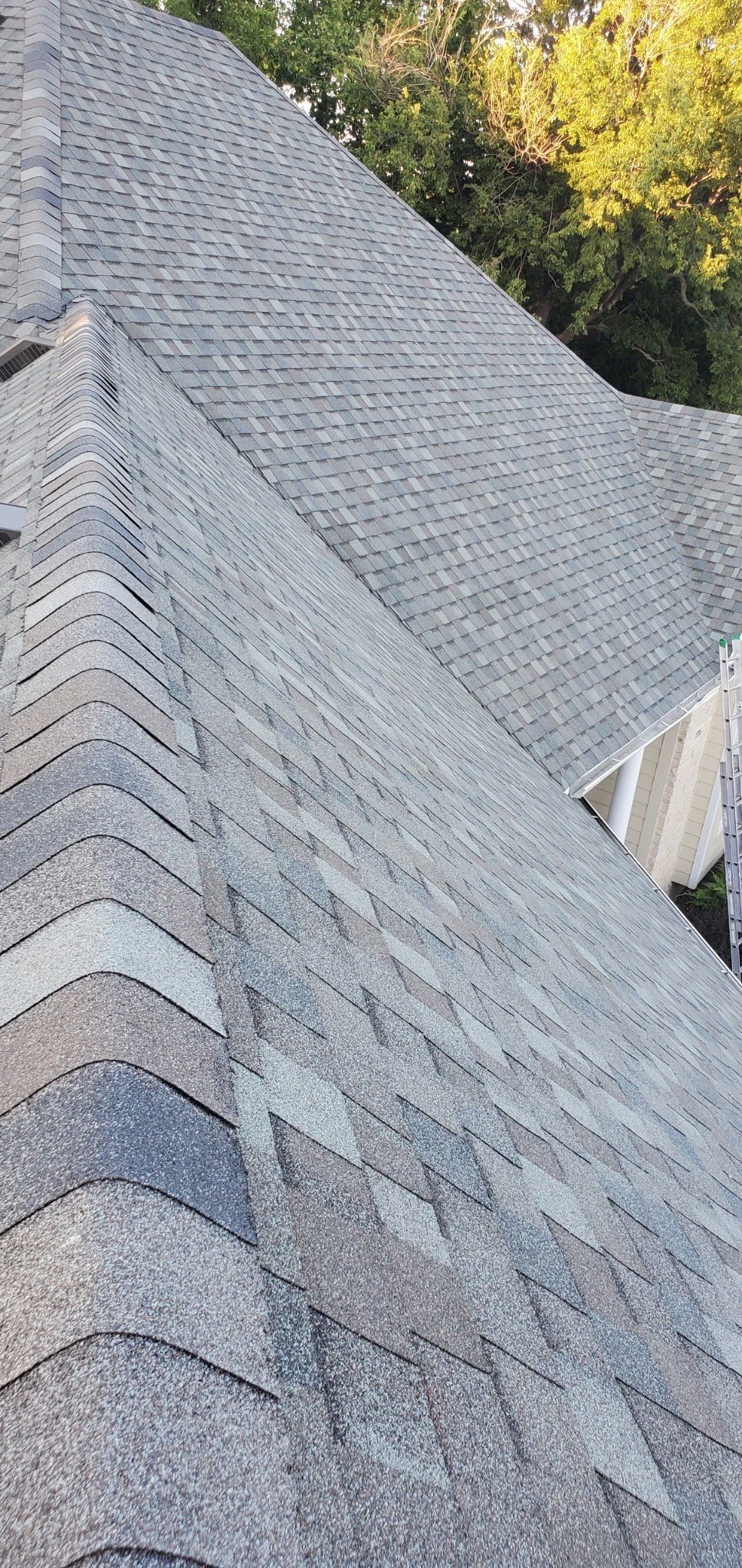 Storm Damaged Roof & Gutter Replacement by Eaton Roofing