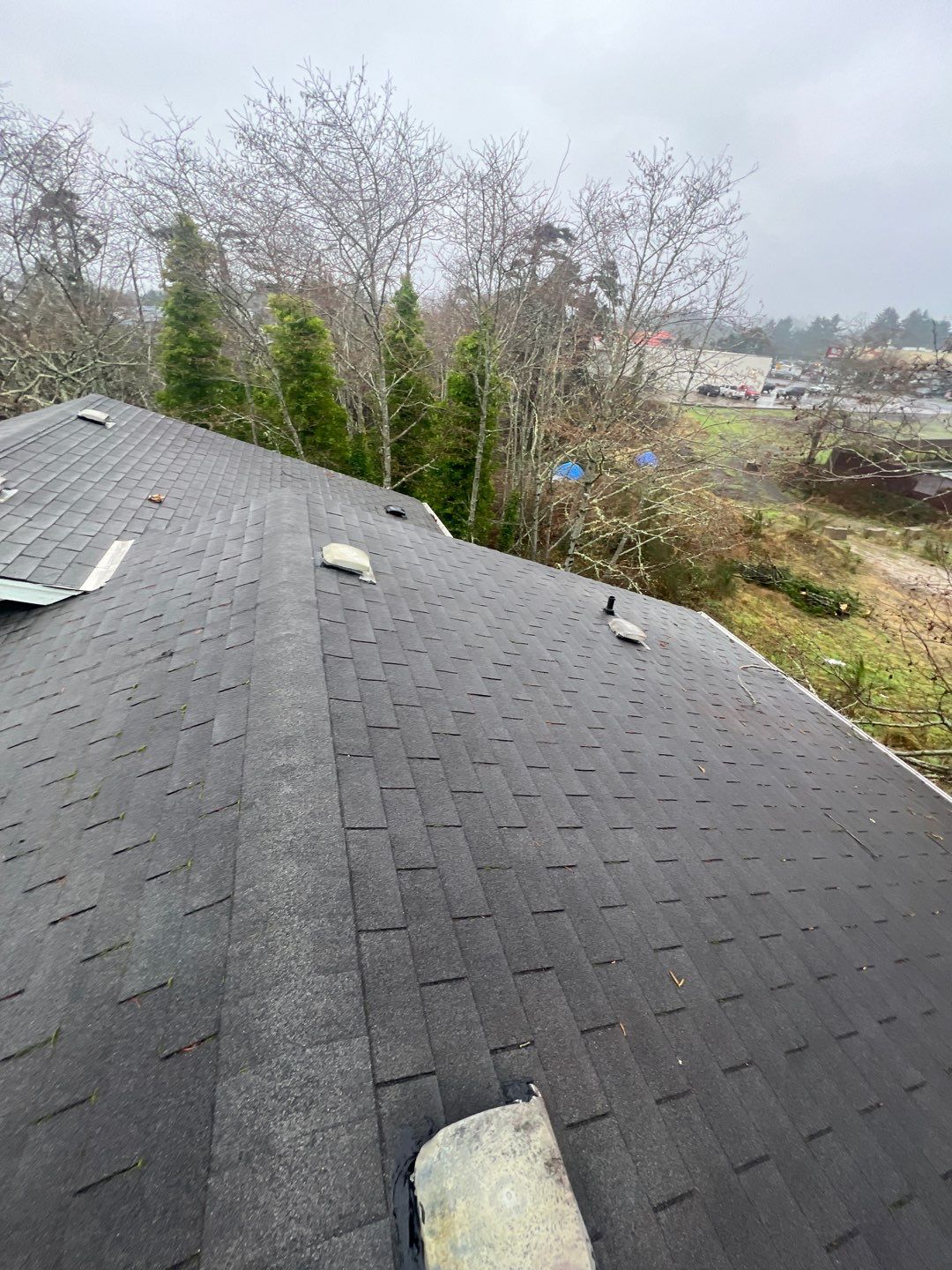 Residential Roofing Installation using Malarkey Highlander (Color: Midnight Black) by Orezona Building & Roofing Company, Inc.