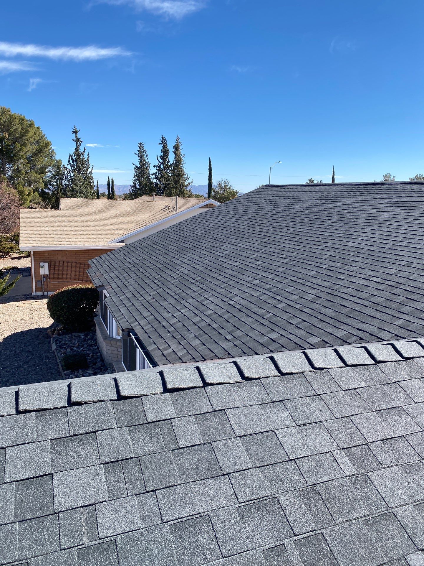 Onyx Black Shingles by Reimagine Roofing
