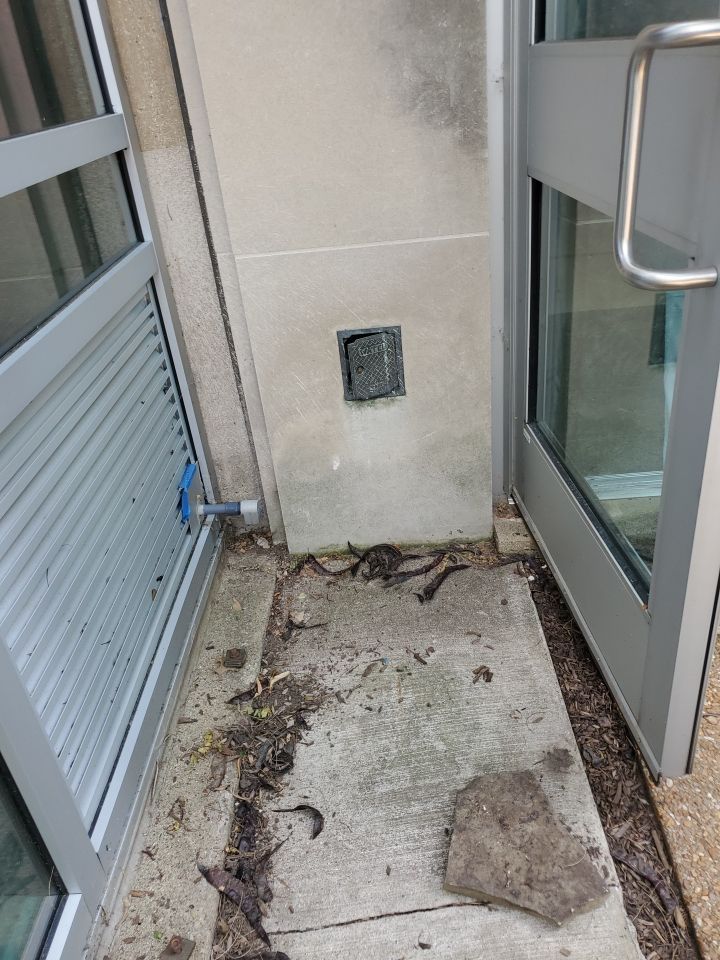 Courtyard pressure washing difficult access.  by Northern Power Washing LLC.