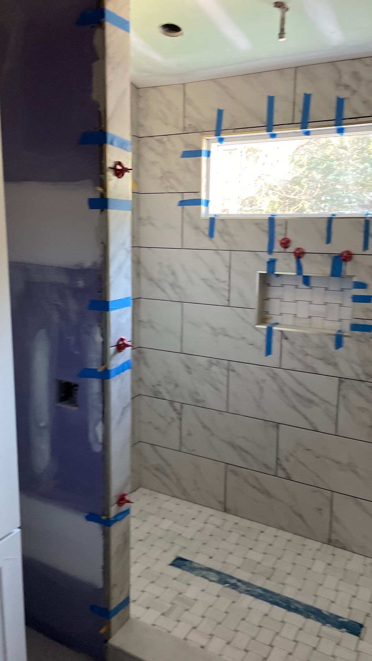 Remodeled Home with new tile floors, Showers and Refinished Oak Floors with stain and Waterbased Finish by Footprints Floors of Coastal Carolina