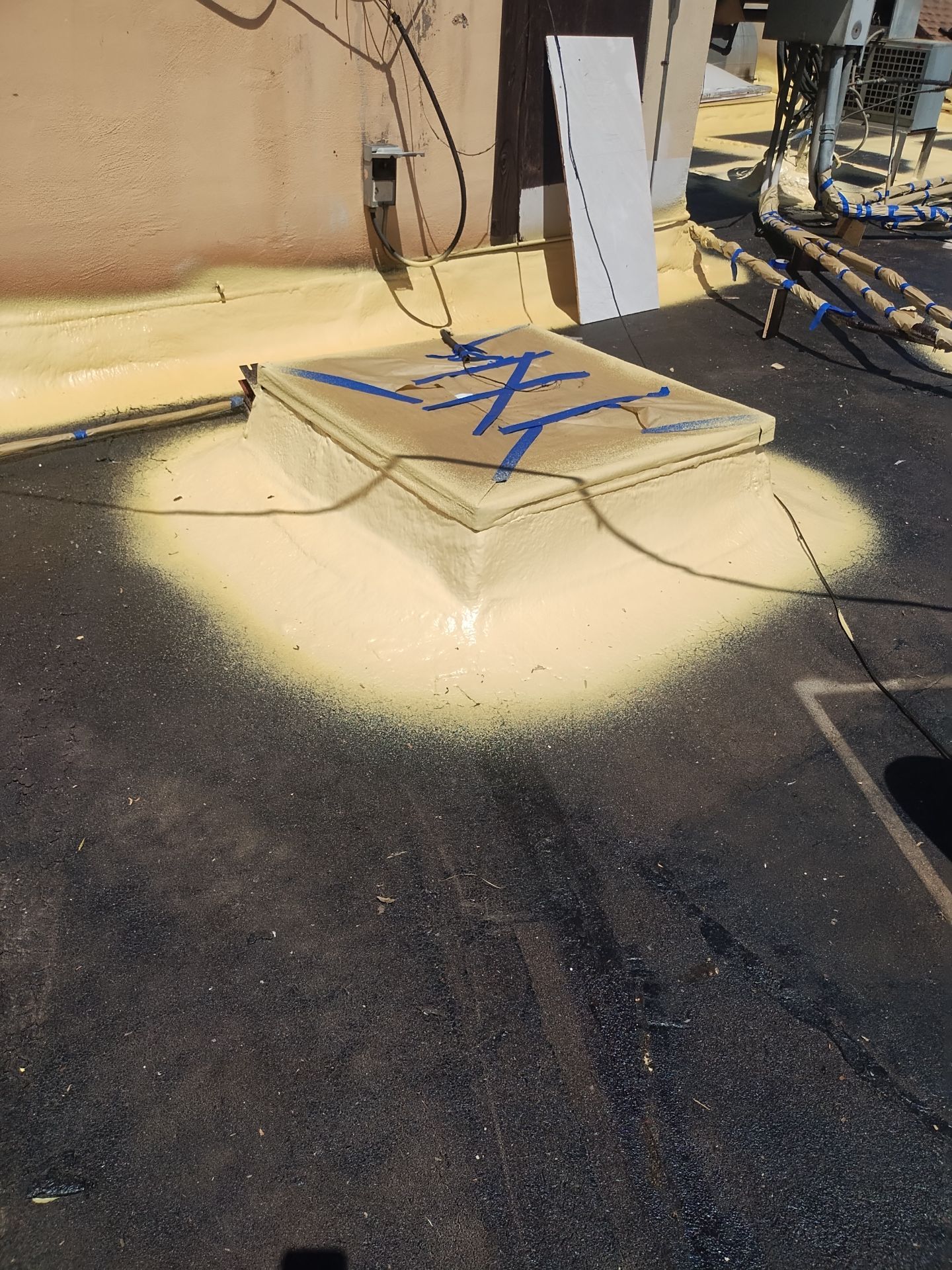 Spray foam and coatings using General Coatings acrylic coatings and spray foam by Straight Edge Roofing Inc