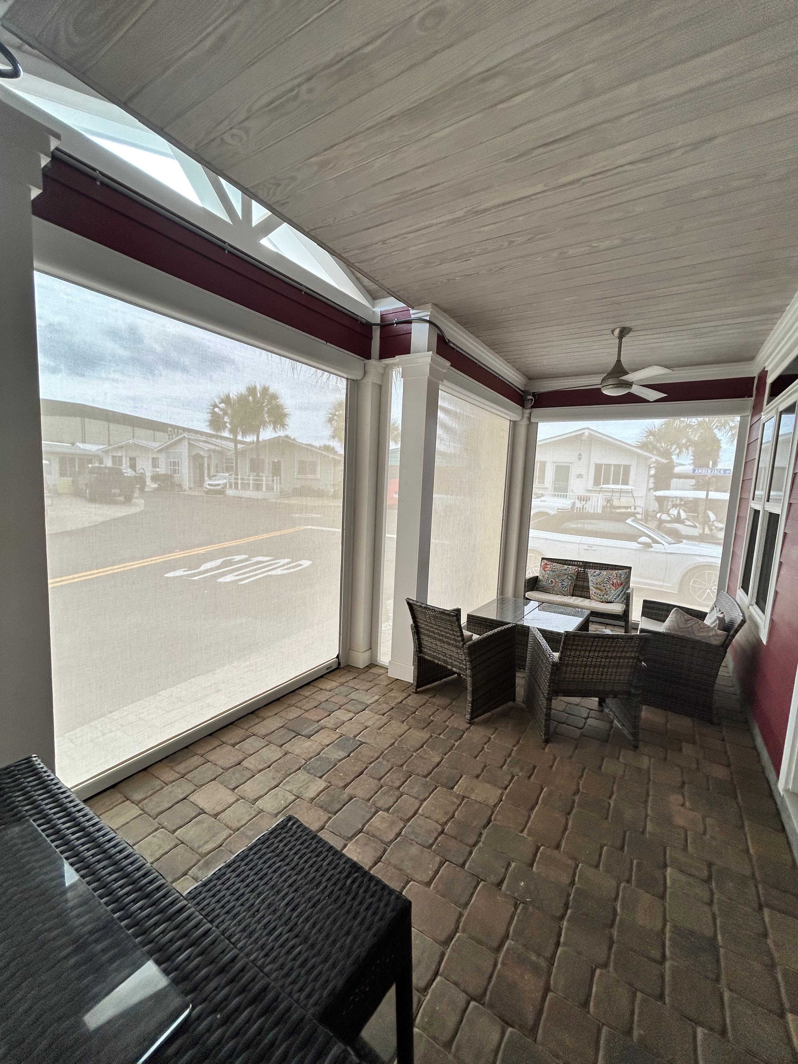 Fenetex Motorized Screen and Hurricane Shutter Installation in Panama City Beach by Brannan Aluminum Inc.