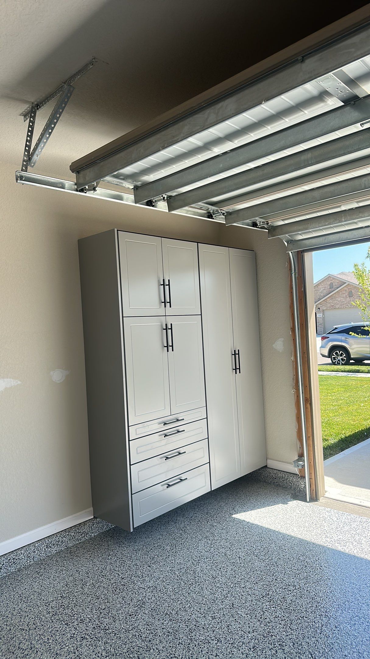 Mike T. changed the look of his garage with a Banner Garage Floor and Storage by Banner Garage