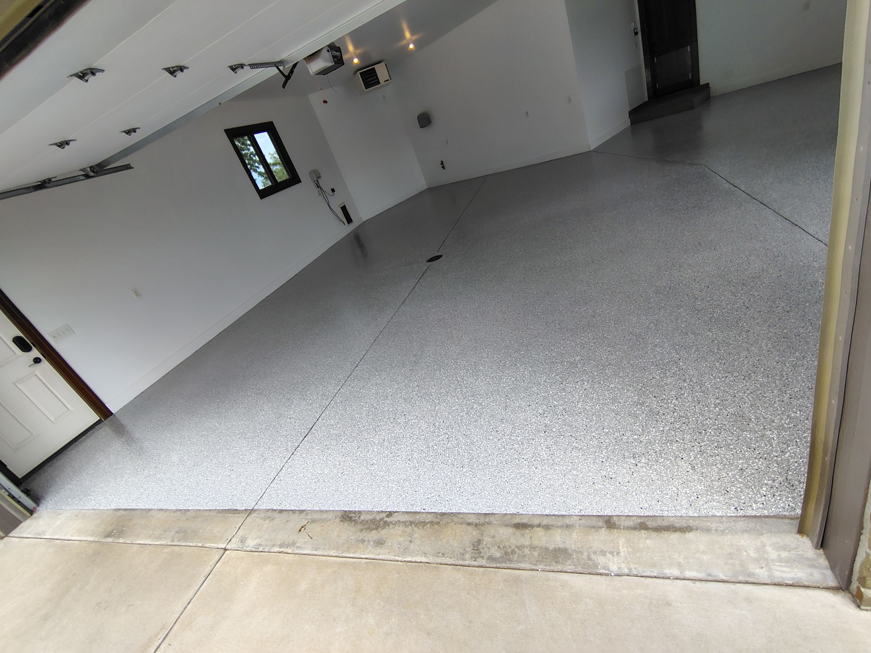 Feather Grey Floor Coating in Sioux Falls, SD by Select Painting, Coatings & Garage Cabinets