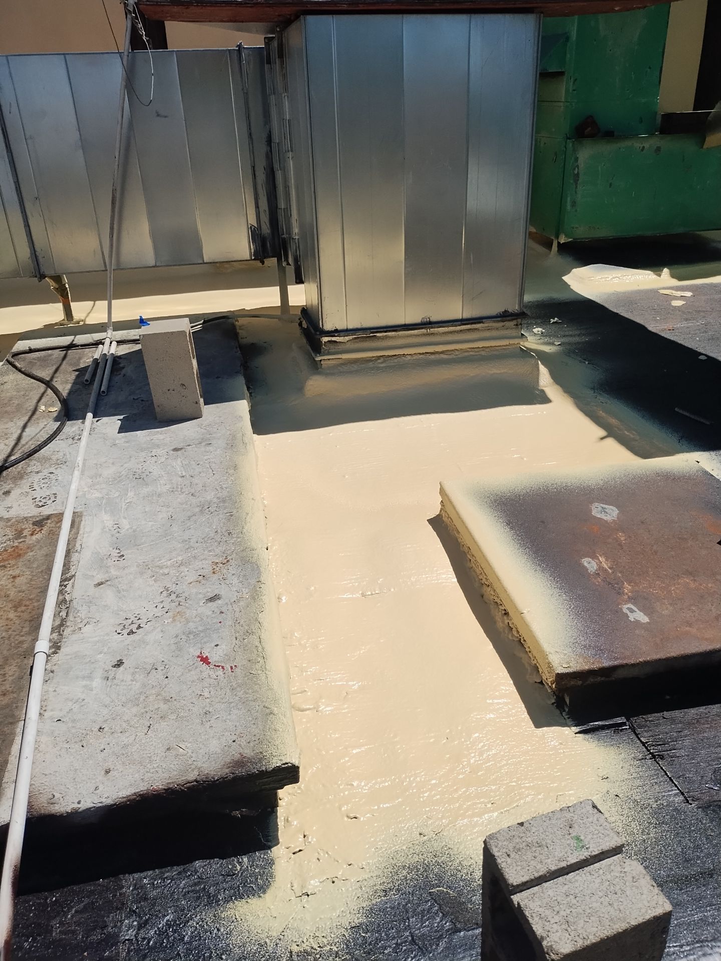 Spray foam and coatings using General Coatings acrylic coatings and spray foam by Straight Edge Roofing Inc