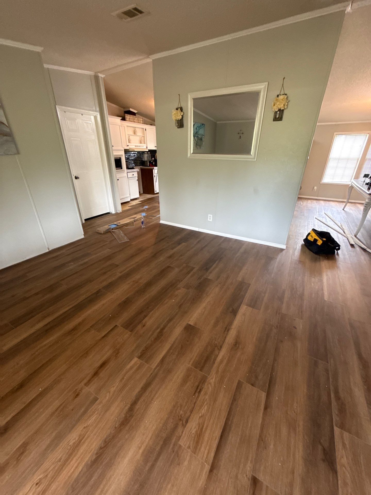 Subfloor Repairs With LVP Installation by Axtra Hand