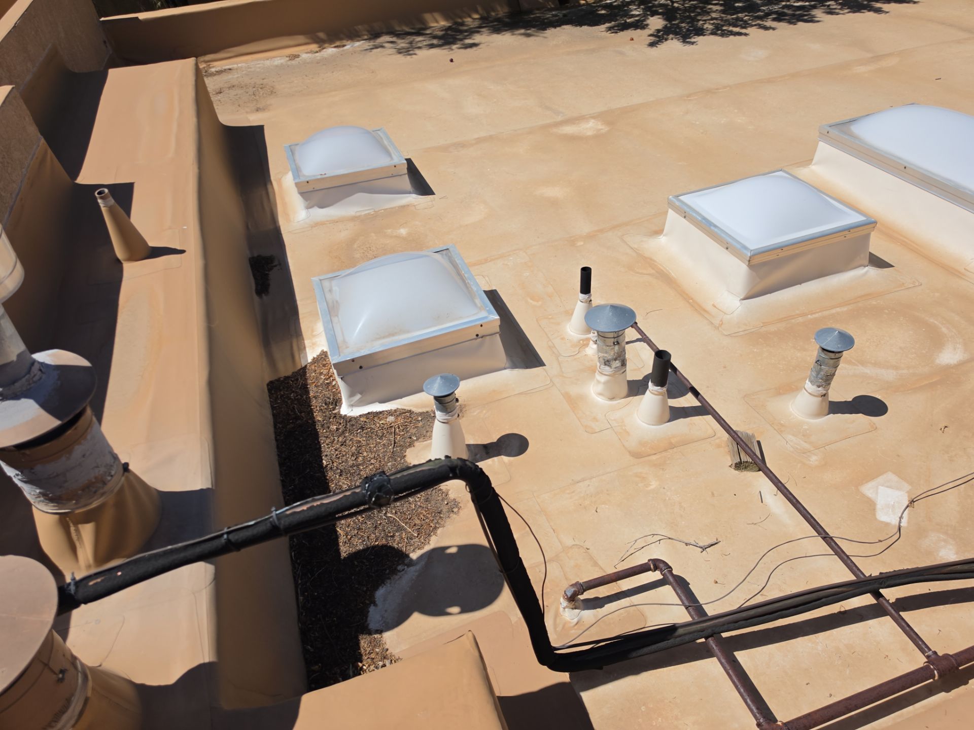 Tile and TPO Roof Maintenance and Gutter Cleaning in Sandia Heights by Doyle Roof Masters Inc