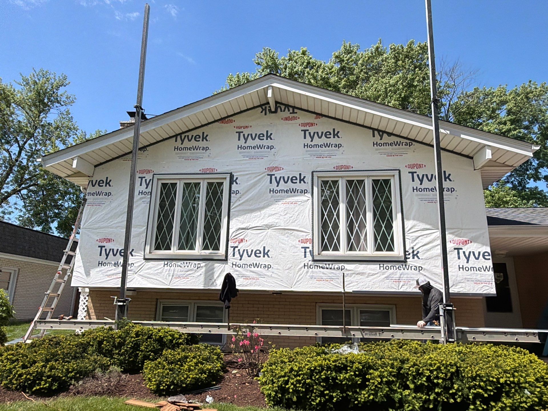 Roof replacement and chimney flashing by Optimal Home Improvement 
