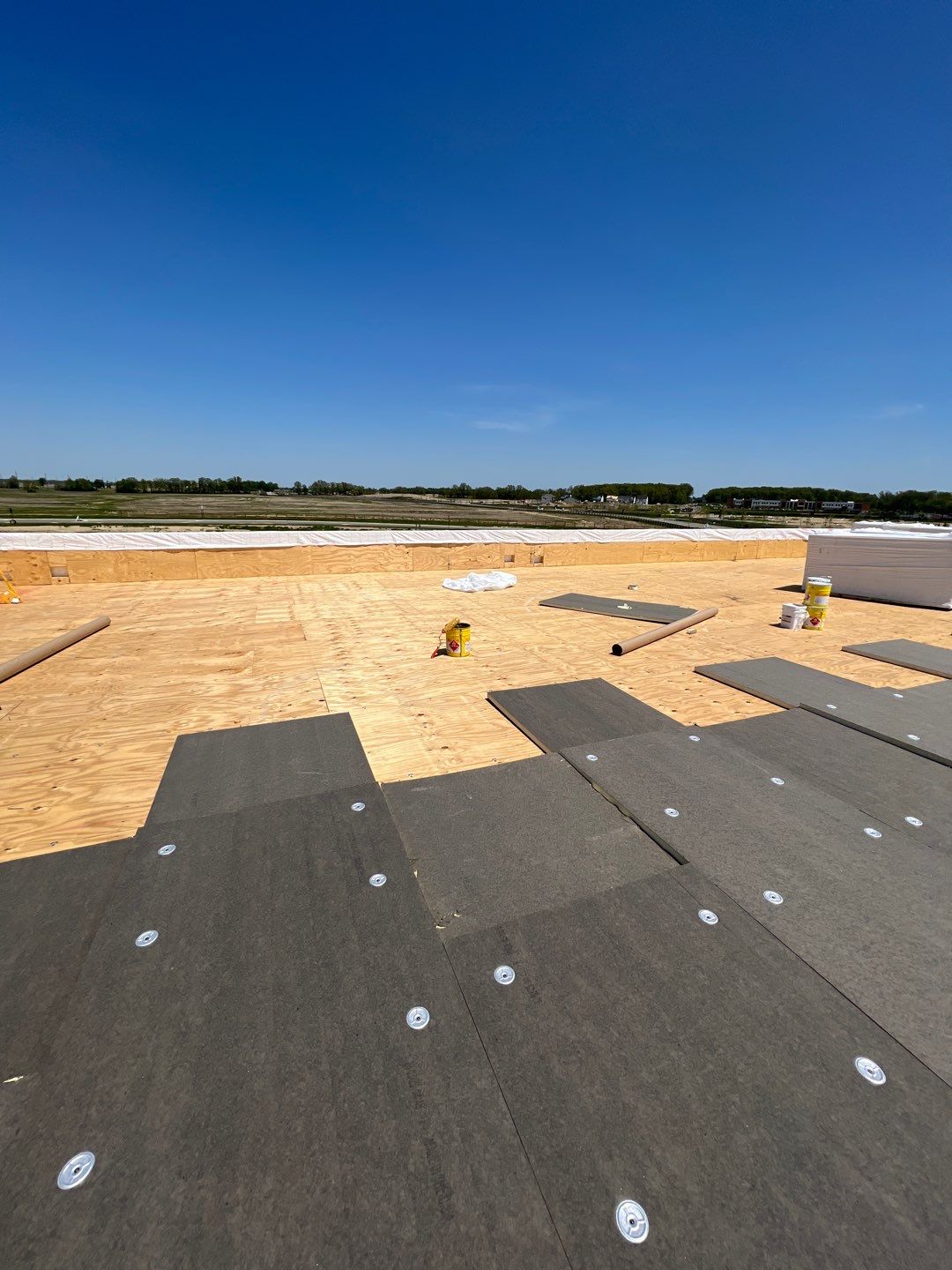 Commercial Roofing Installation using 60 mil rubber roof  by Nitro Roofing and Construction