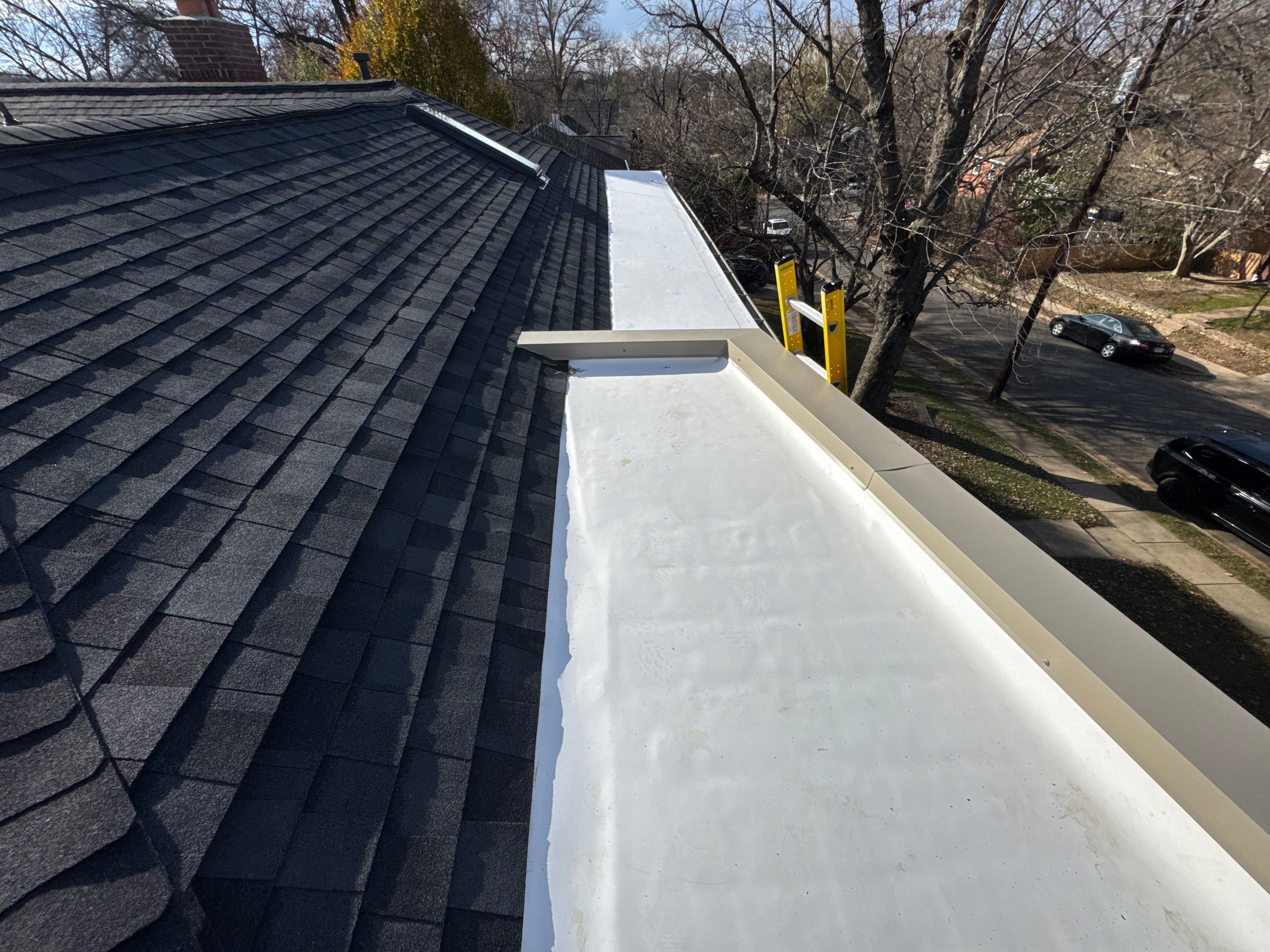 Residential Roofing Installation using Shingle and Flat Roof Combo by USA Storm Roofing and Construction Group