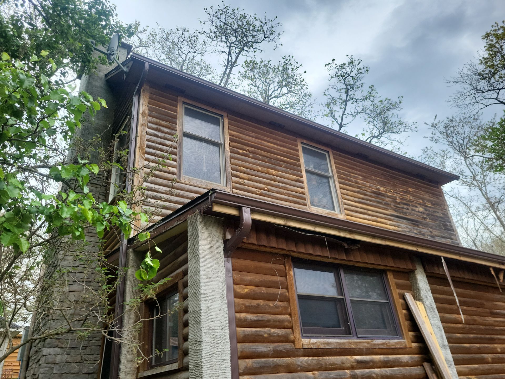 Residential Roof + Gutters & Downspouts Install  by Titan Commercial & Residential Roofing 