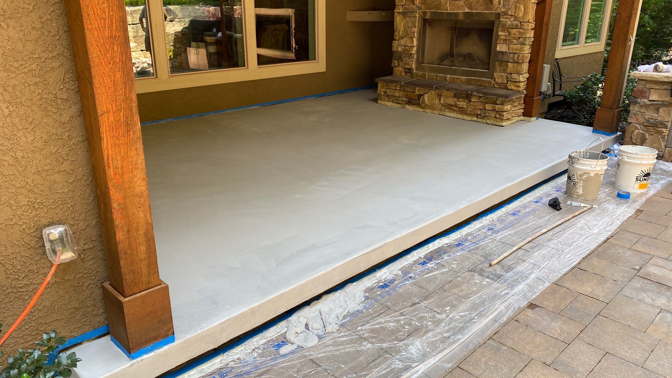 Lenexa, KS -- Front Stoop Before and After Tuscan Overlay by Big Red Decorative Concrete, LLC