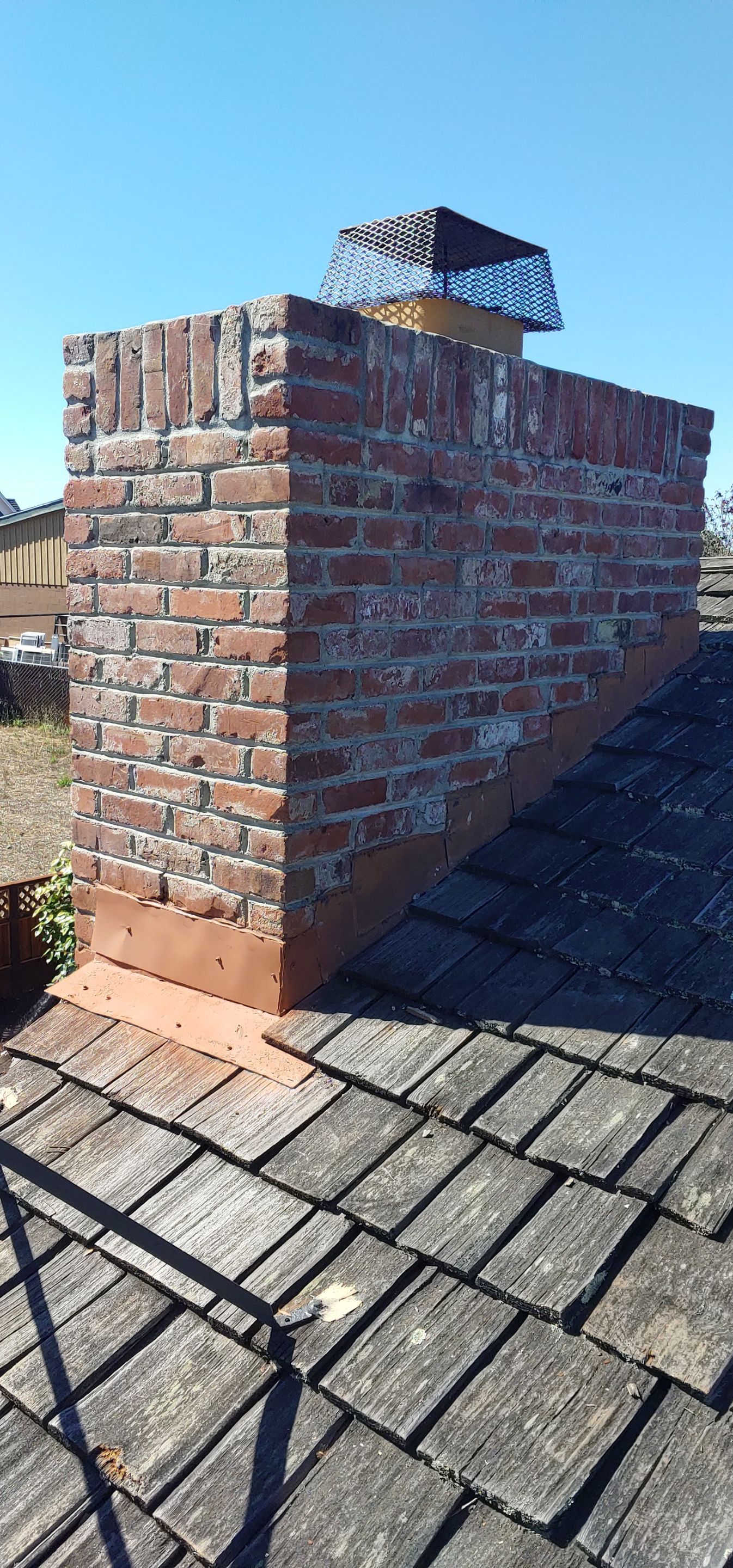 Refurbish and repair shake roof to get ready to sell by Straight Edge Roofing Inc