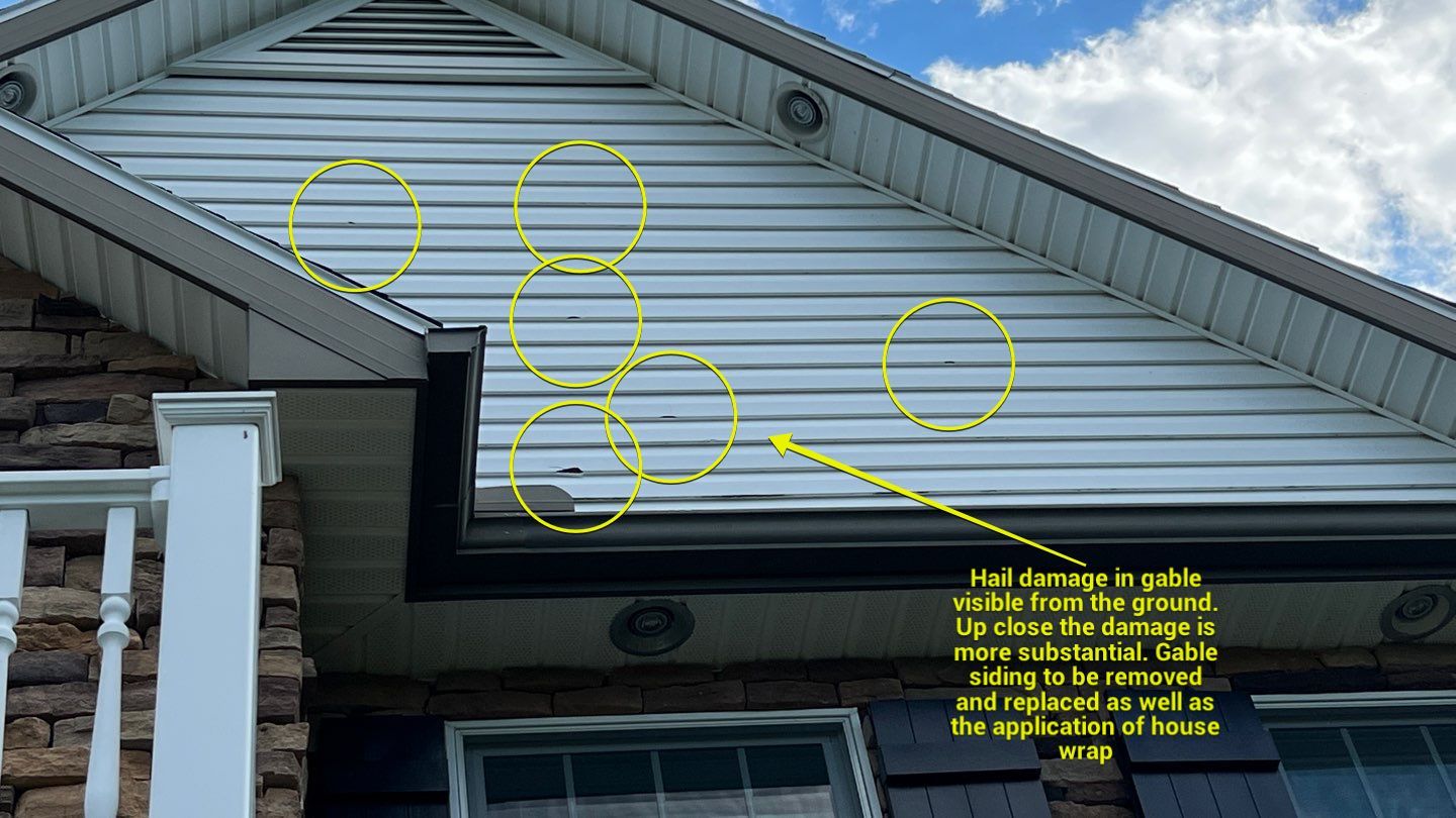 Roof Damage using Certainteed Lifetime Roofing System- Moire Black Landmark Pro shingkes with shadow ridge caps. by BulletpROOF Exteriors