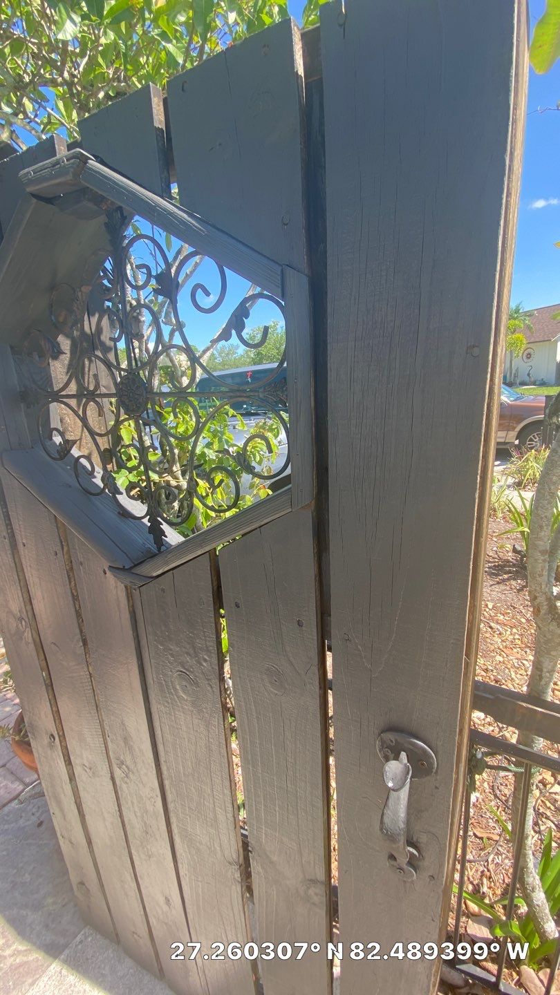 Sarasota, FL 6ft. Tall Horizontal Shadowbox Wood with 4ft. Tall 3-Rail Black Aluminum Fence by Asap fence and gates, LLC