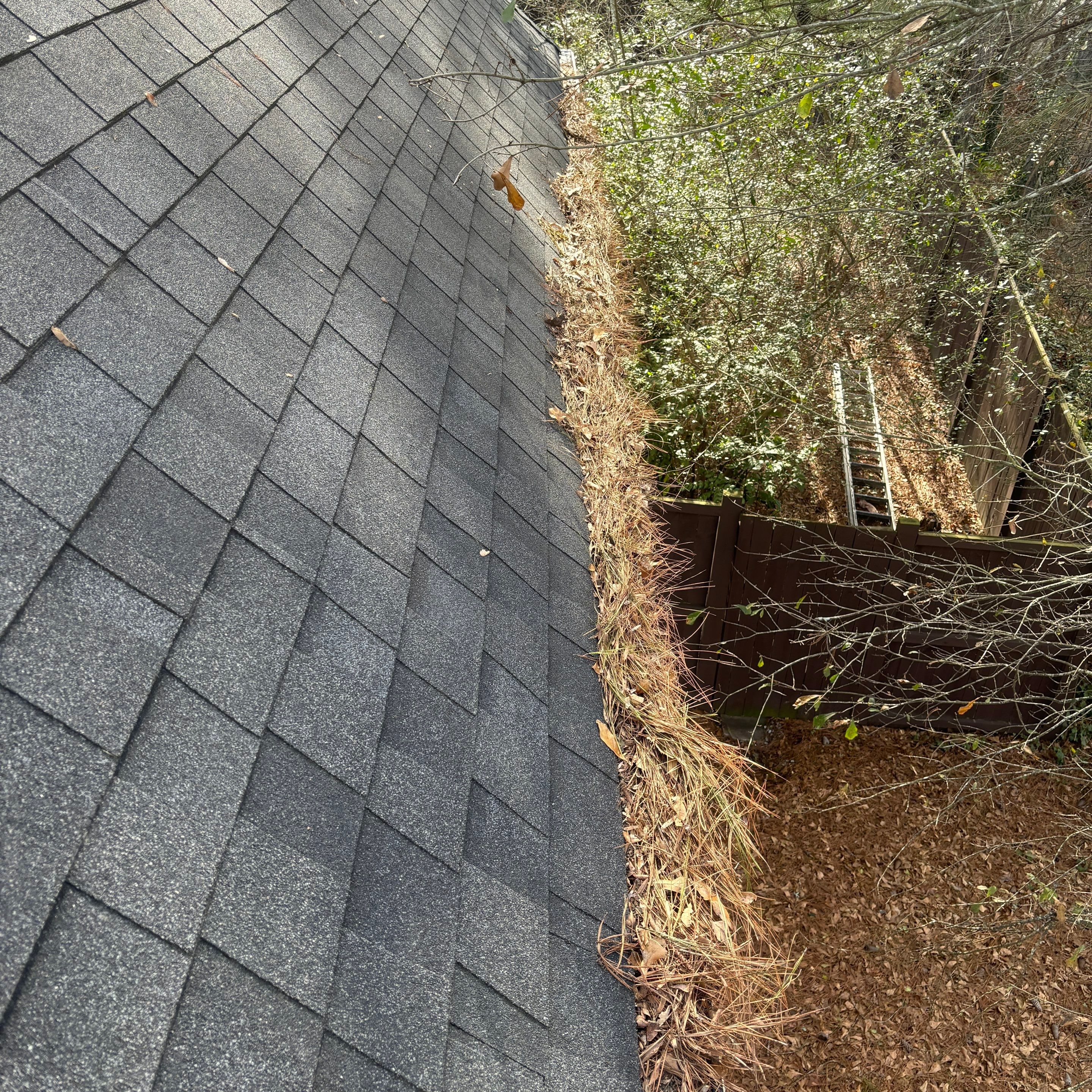 Cleaning Gutters  by Deerfield Roofing LLC