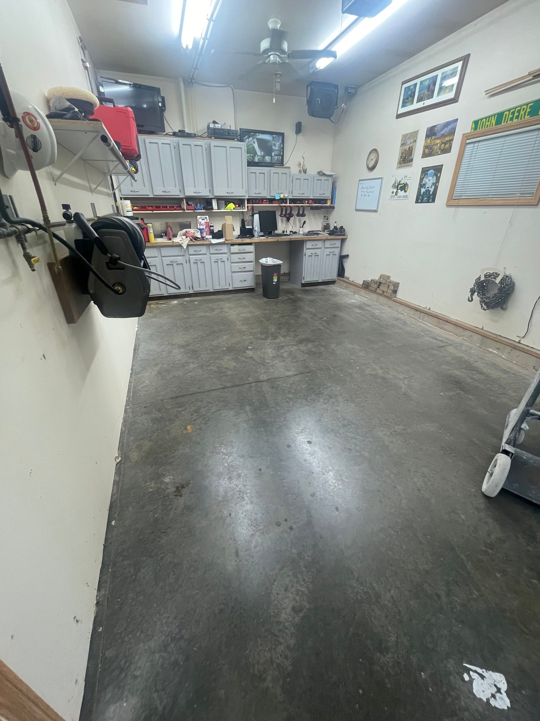 Multi-Stall Garage Floor Coating Installation in Sioux Falls by Select Painting, Coatings & Garage Cabinets