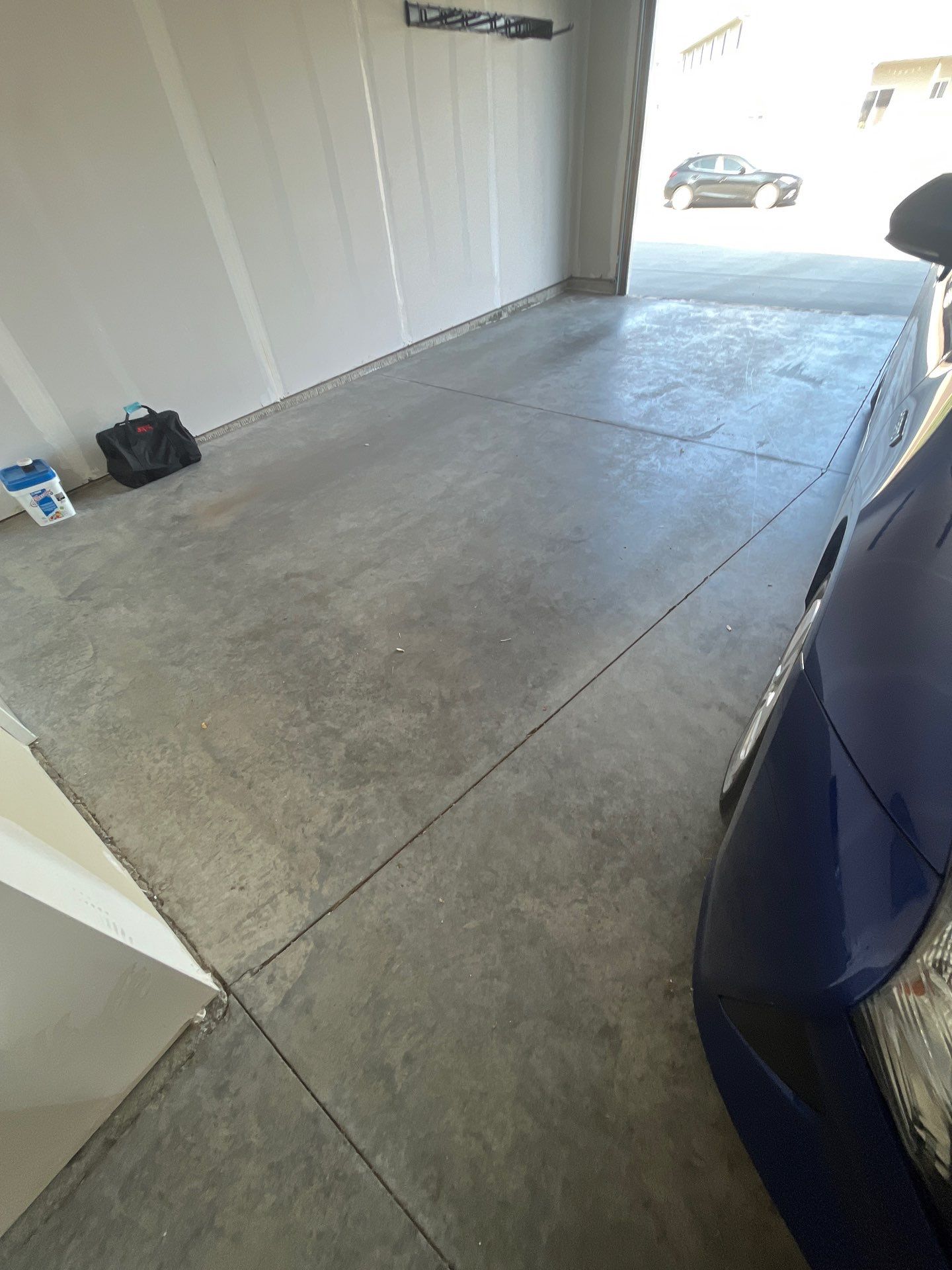 Custom Coyote Flake Garage Floor Coating in Sioux Falls by Select Painting, Coatings & Garage Cabinets