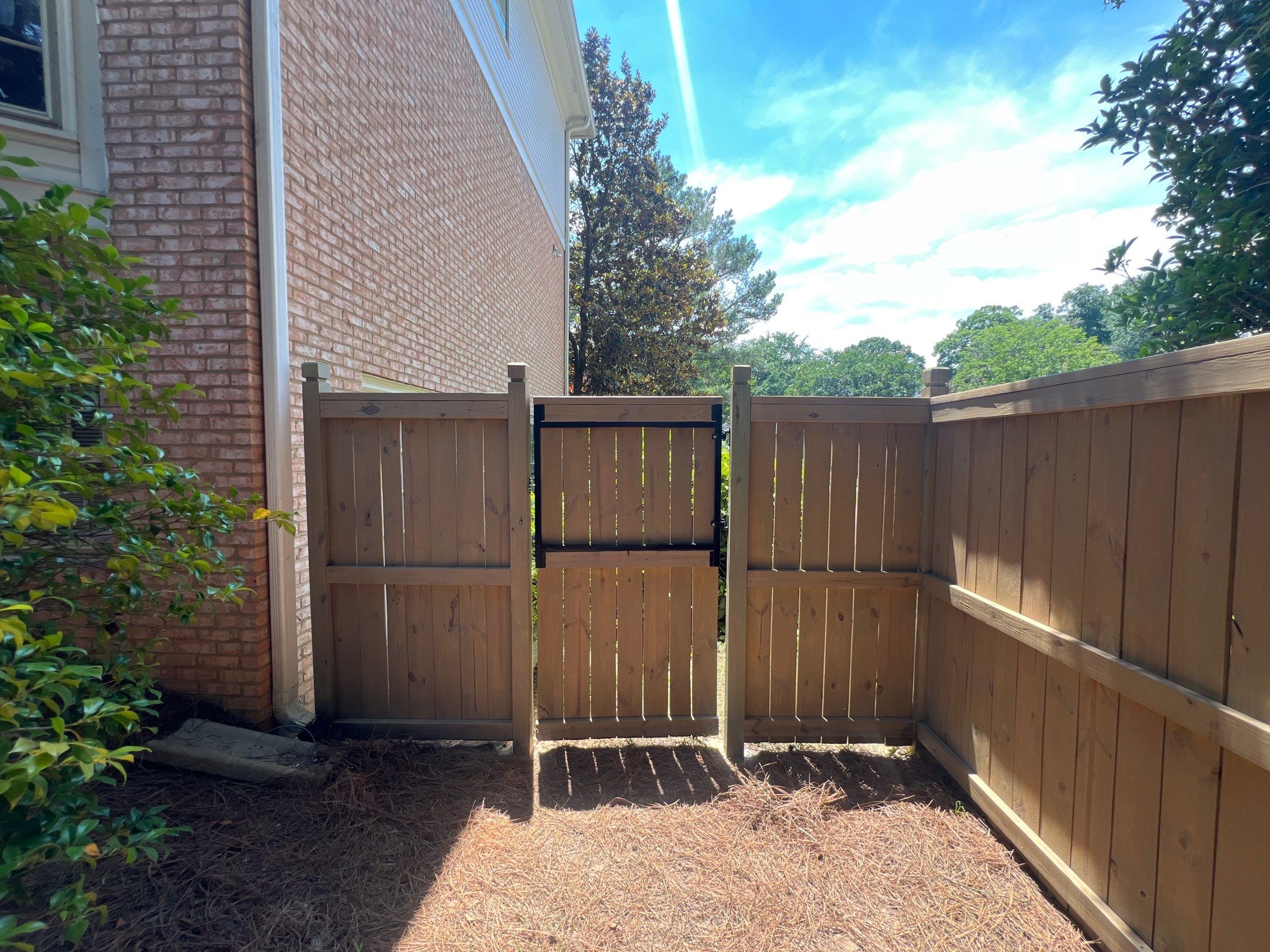 Pressure-Treated Wood Fence Installation and Deck Staining in Atlanta by Swift Home Renovations