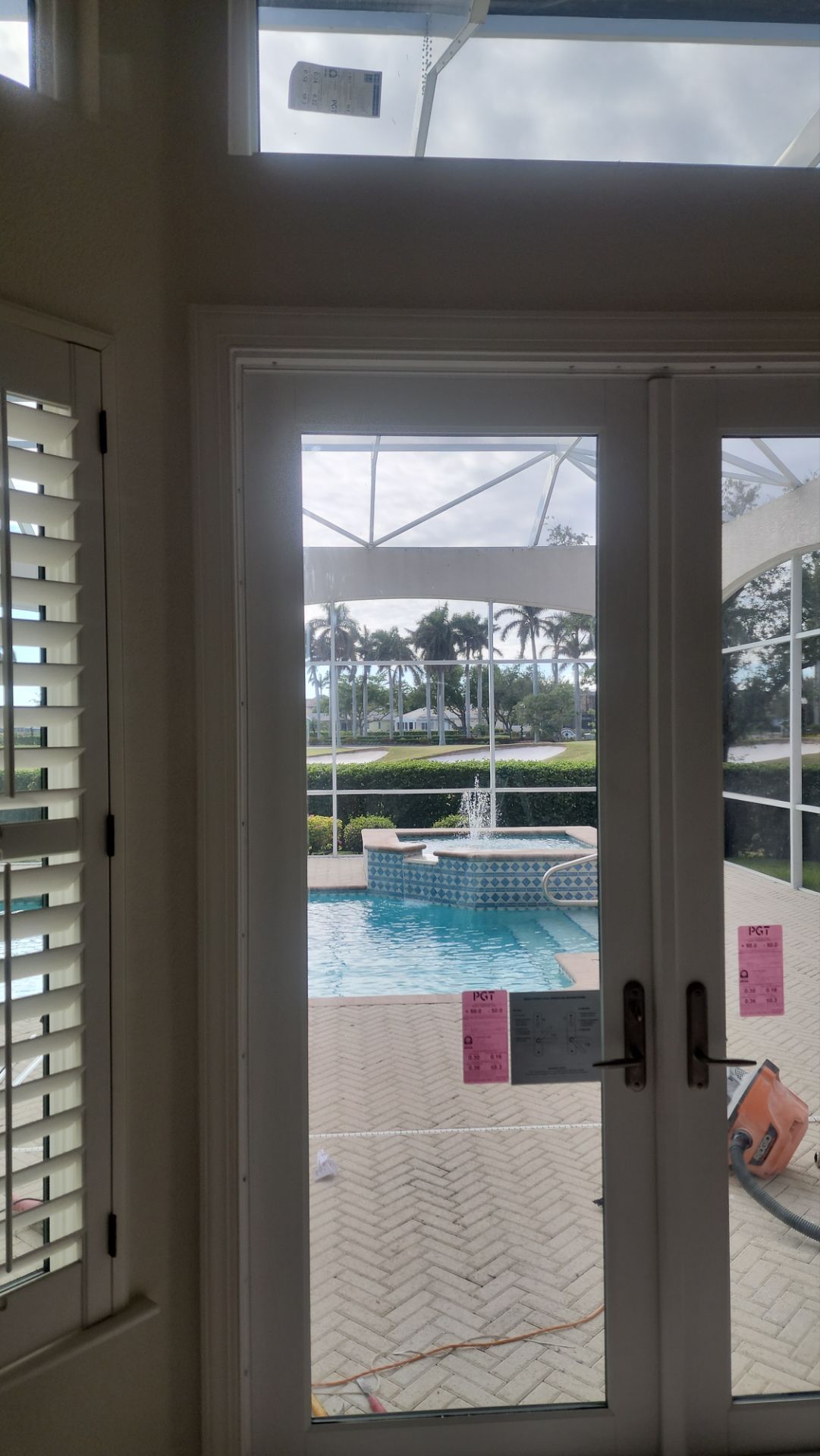 Window Installation using PGT Vinyl White-Bronze by Windows For Life 