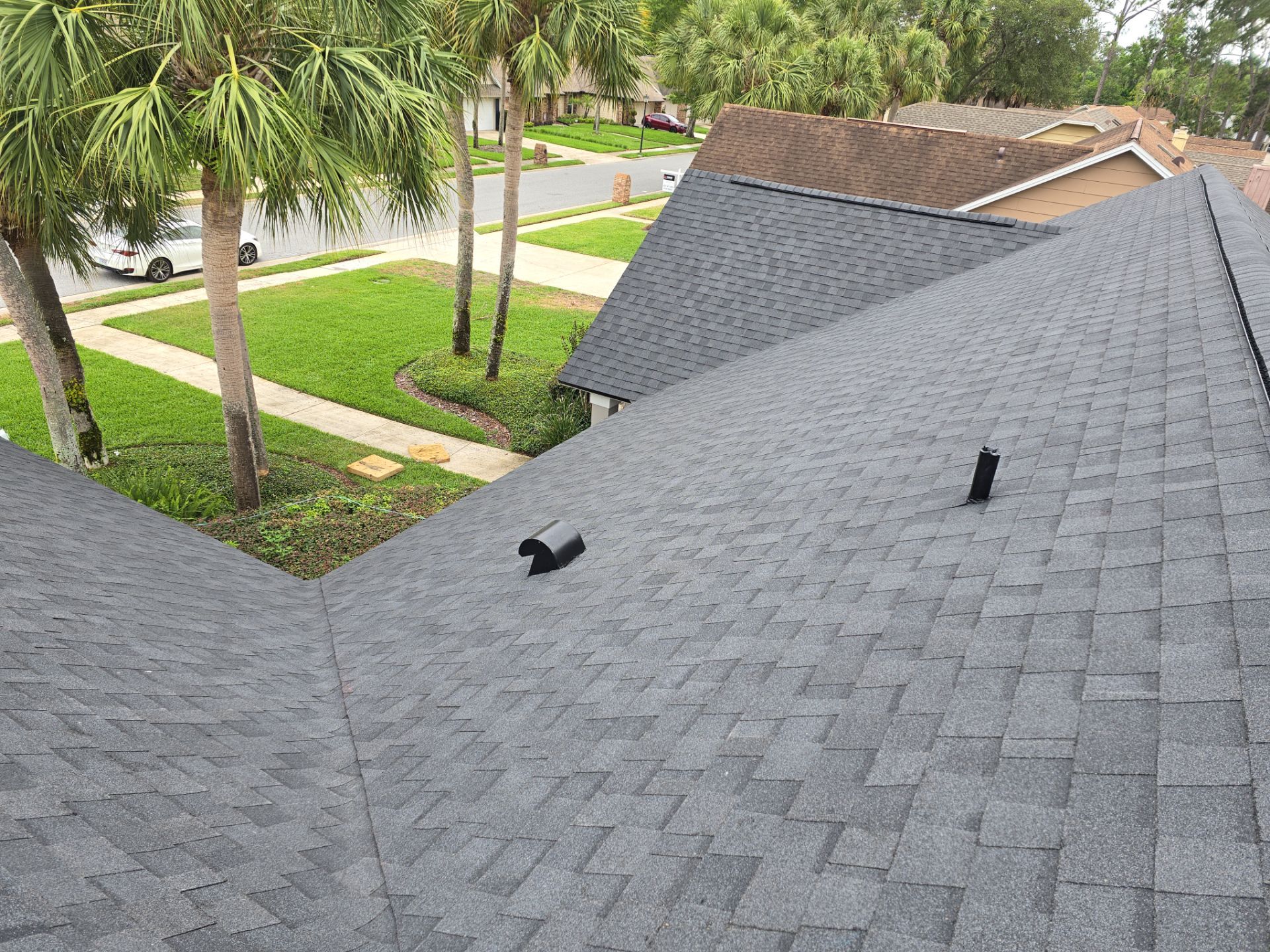 Asphalt Architectural Shingle Roof Replacement and Solar Integration in Longwood by Fortified Roofing Solutions Corp.