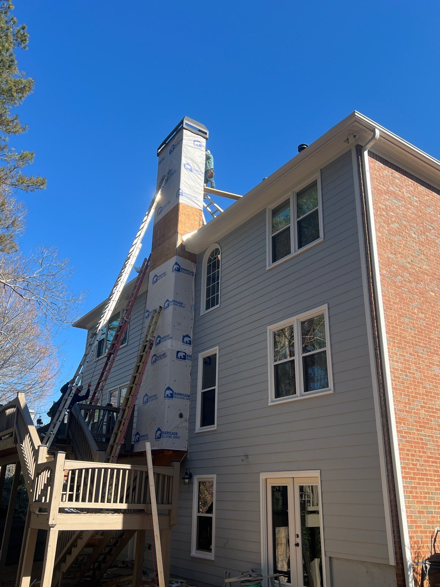 Chimney Siding Reconstruction and Full Exterior Painting in Marietta by Swift Home Renovations