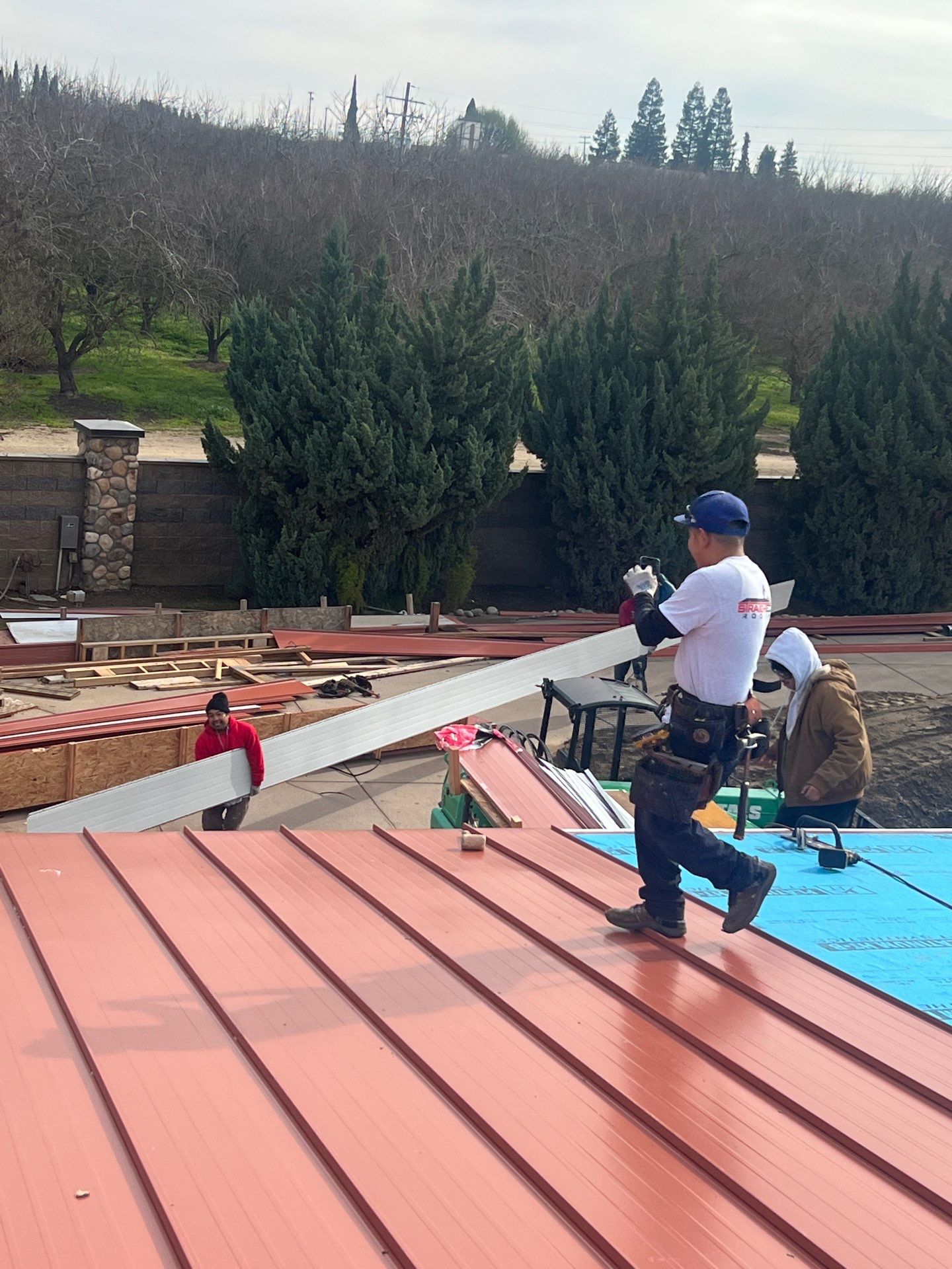 Tile, Metal, and TPO roofing project (new construction) by Straight Edge Roofing Inc