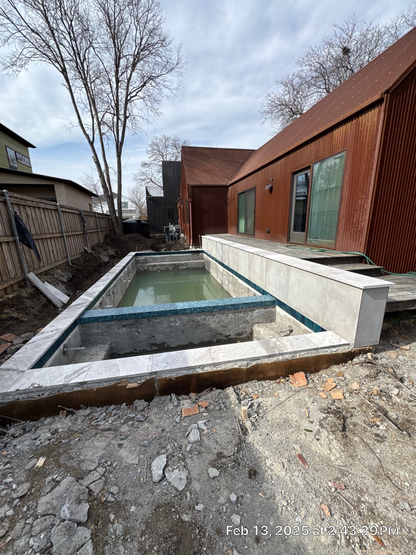 Modern Pool with Fire Wall by Pinnacle Pools and Spas - DFW