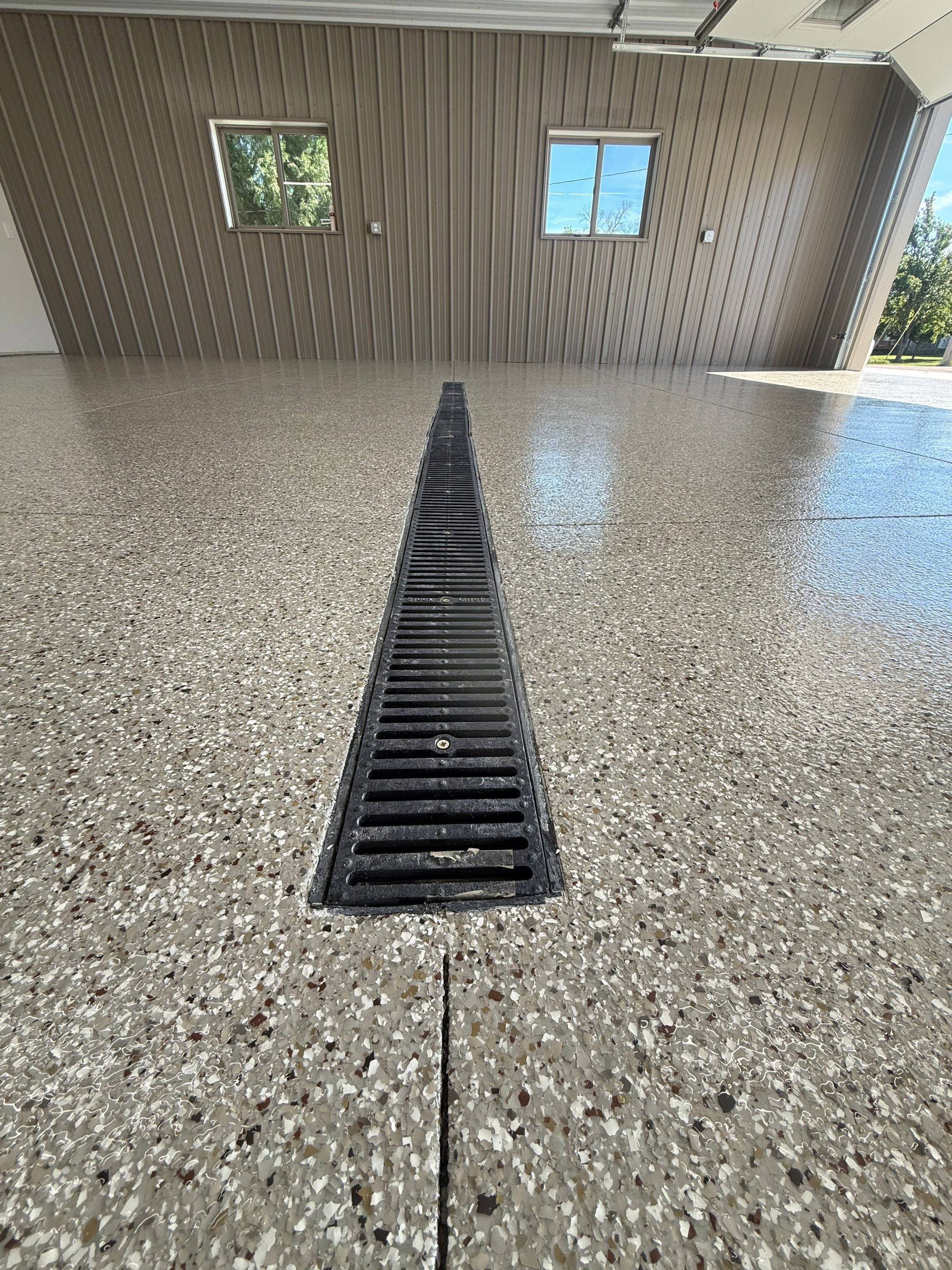Creekbed Flake Coating in Woonsocket, SD by Select Painting, Coatings & Garage Cabinets