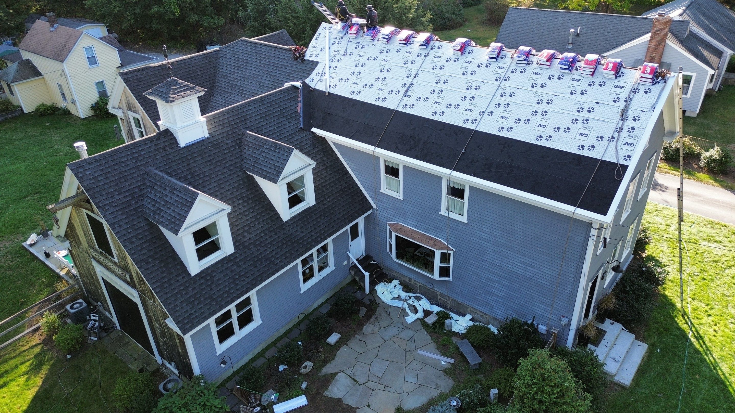 Roof Replacement & Chimney Removal – Westford, MA by Mighty Dog Roofing of Greater Middlesex County