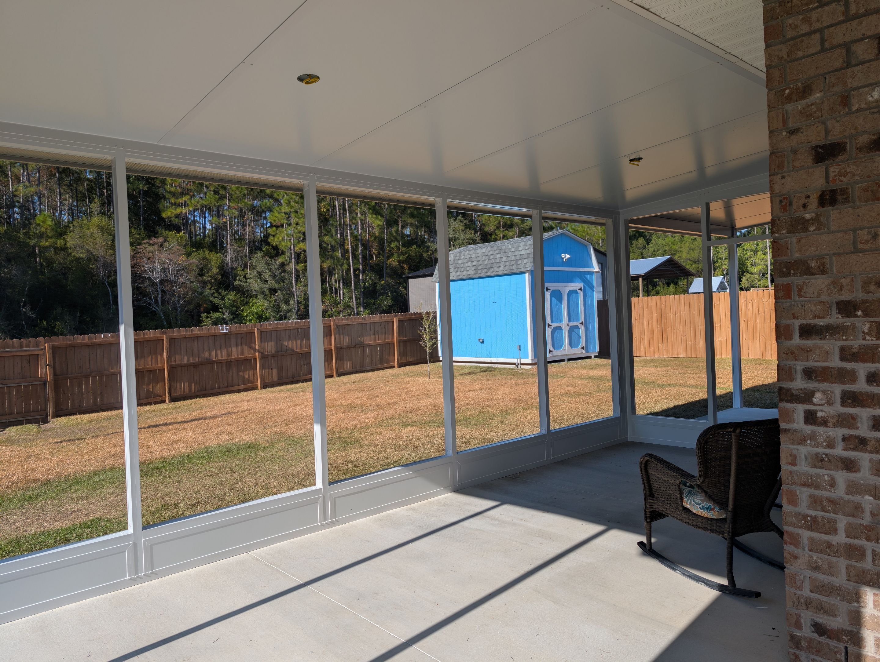 Home addition w/Vinyl 4-Track Windows by Titan Sunrooms