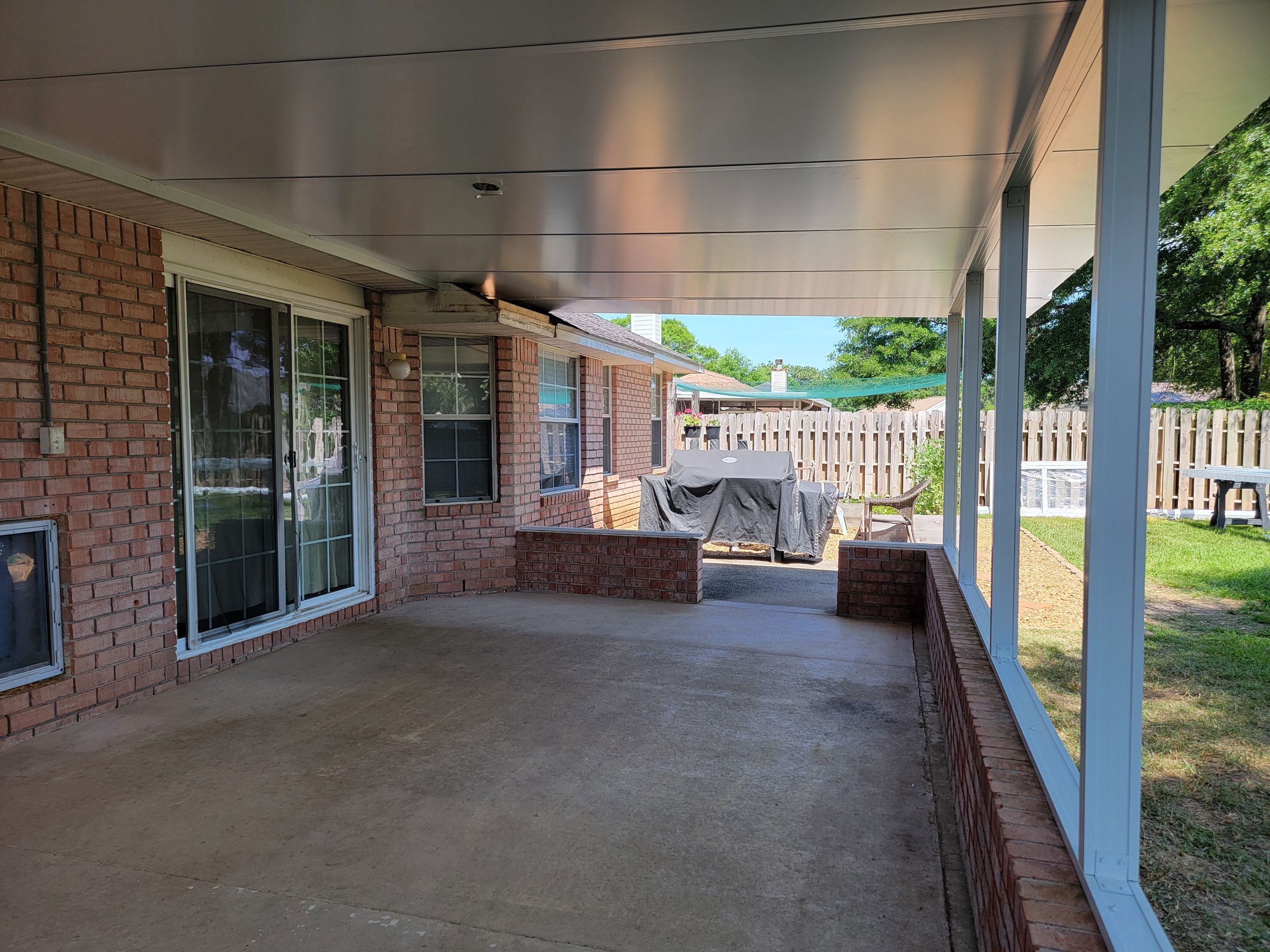 Screen Room in Milton w/Brick Kneewall by Titan Sunrooms