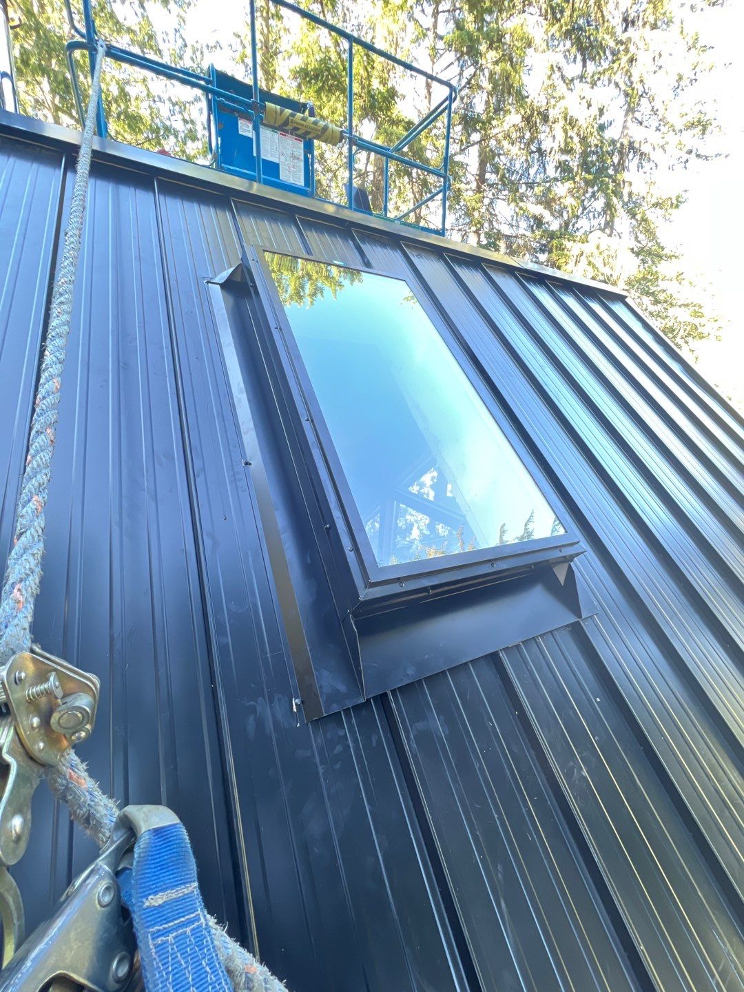 Residential ReRoofing Installation using 12" Prolok metal  by Top Notch Roofing Inc