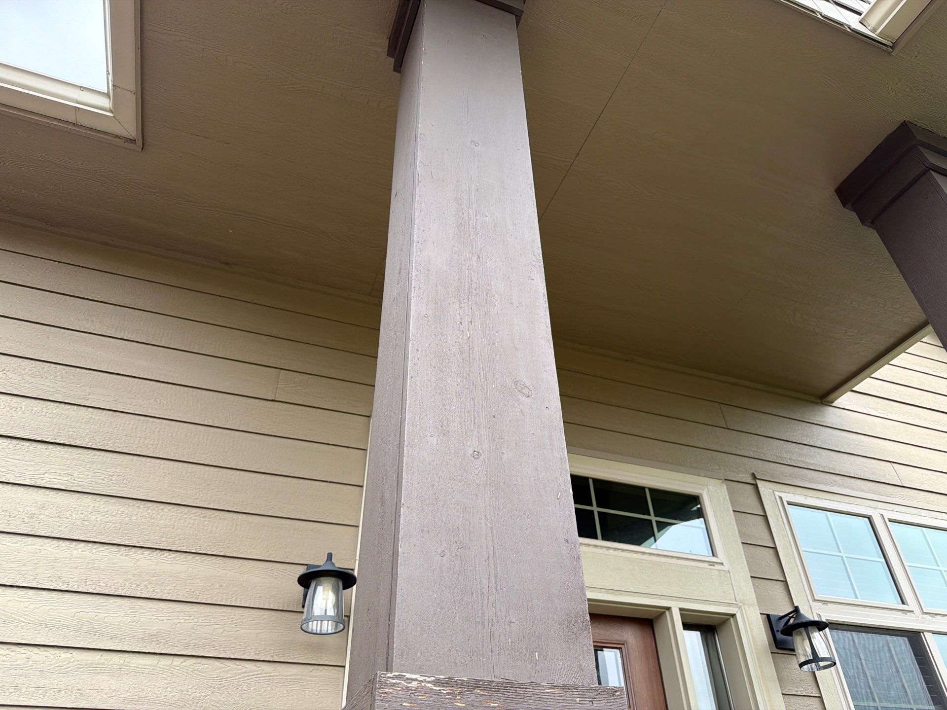 Full Exterior Siding Repaint for Sioux Falls Home and Garage by Select Painting, Coatings & Garage Cabinets