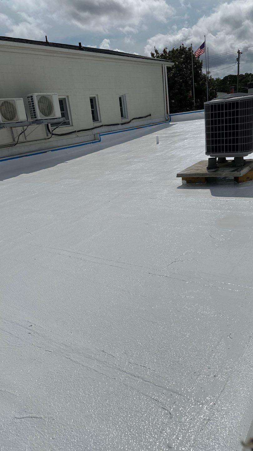 Roof Installation using Flat Roof - EPDM by ExteriorPros