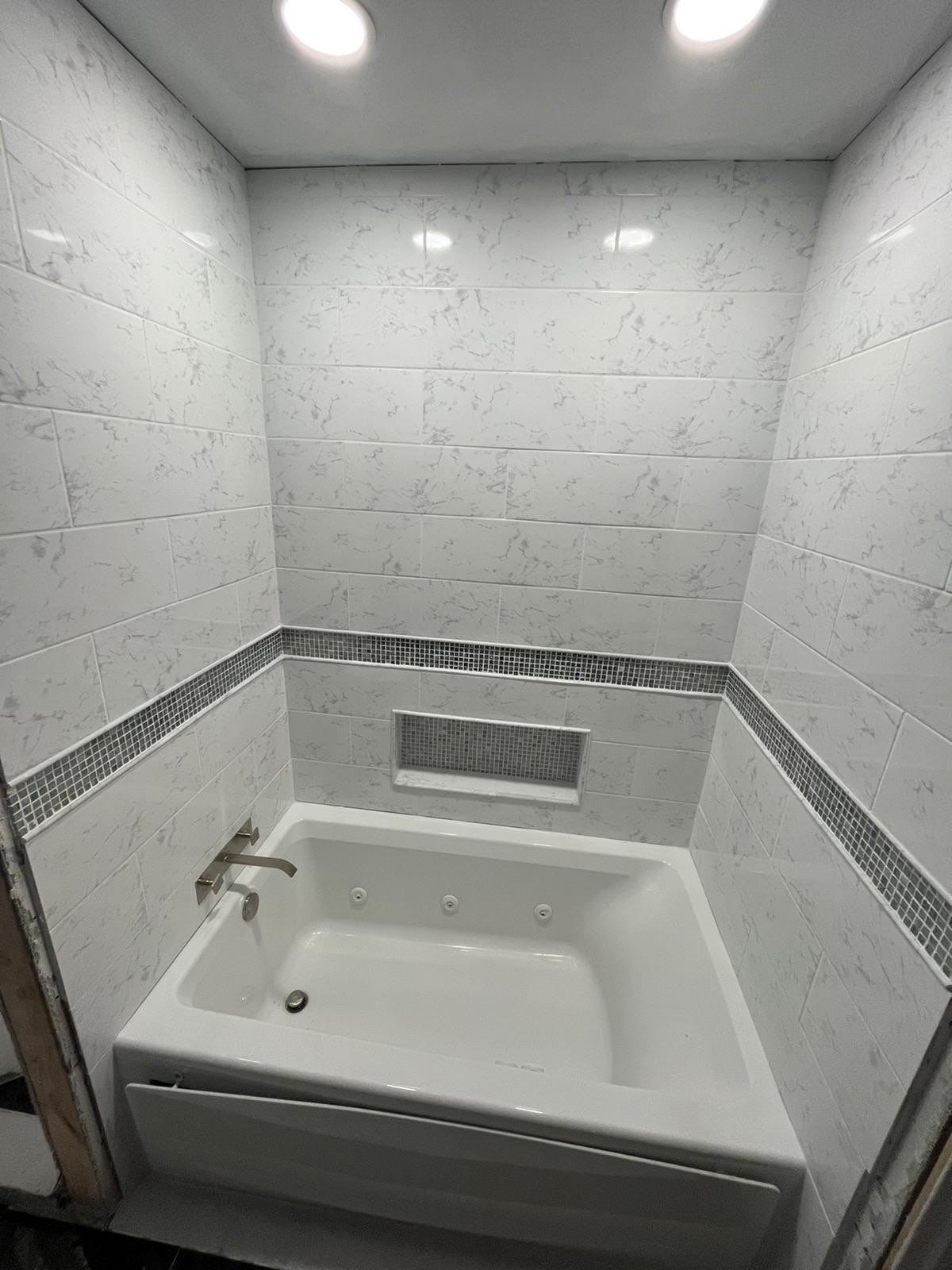 Bathroom Remodel using Tile by Home Concepts Construction