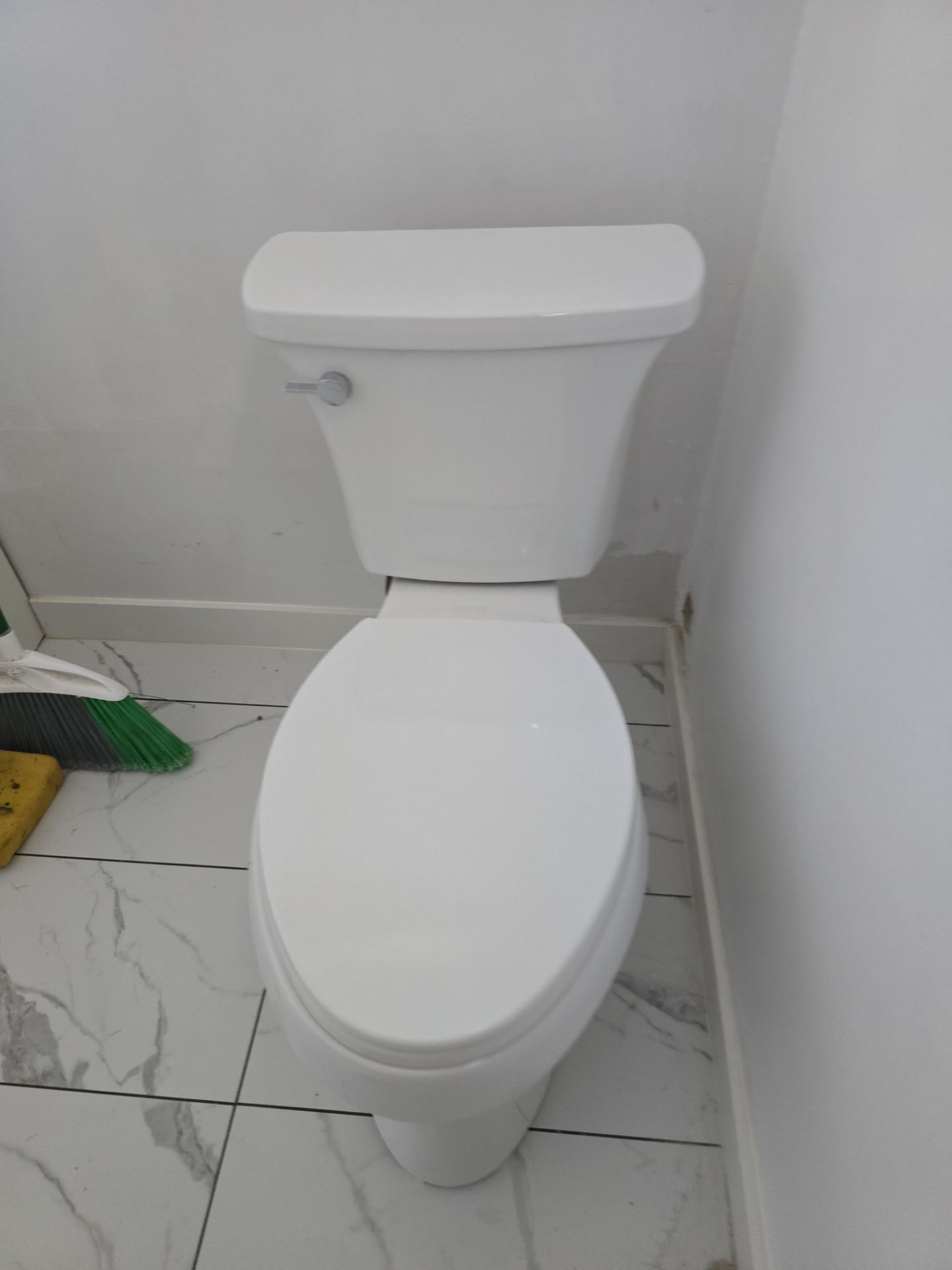 Installation of New Cap for Water Heater, Under-Sink Plumbing, and New Toilet by Us Plumbing