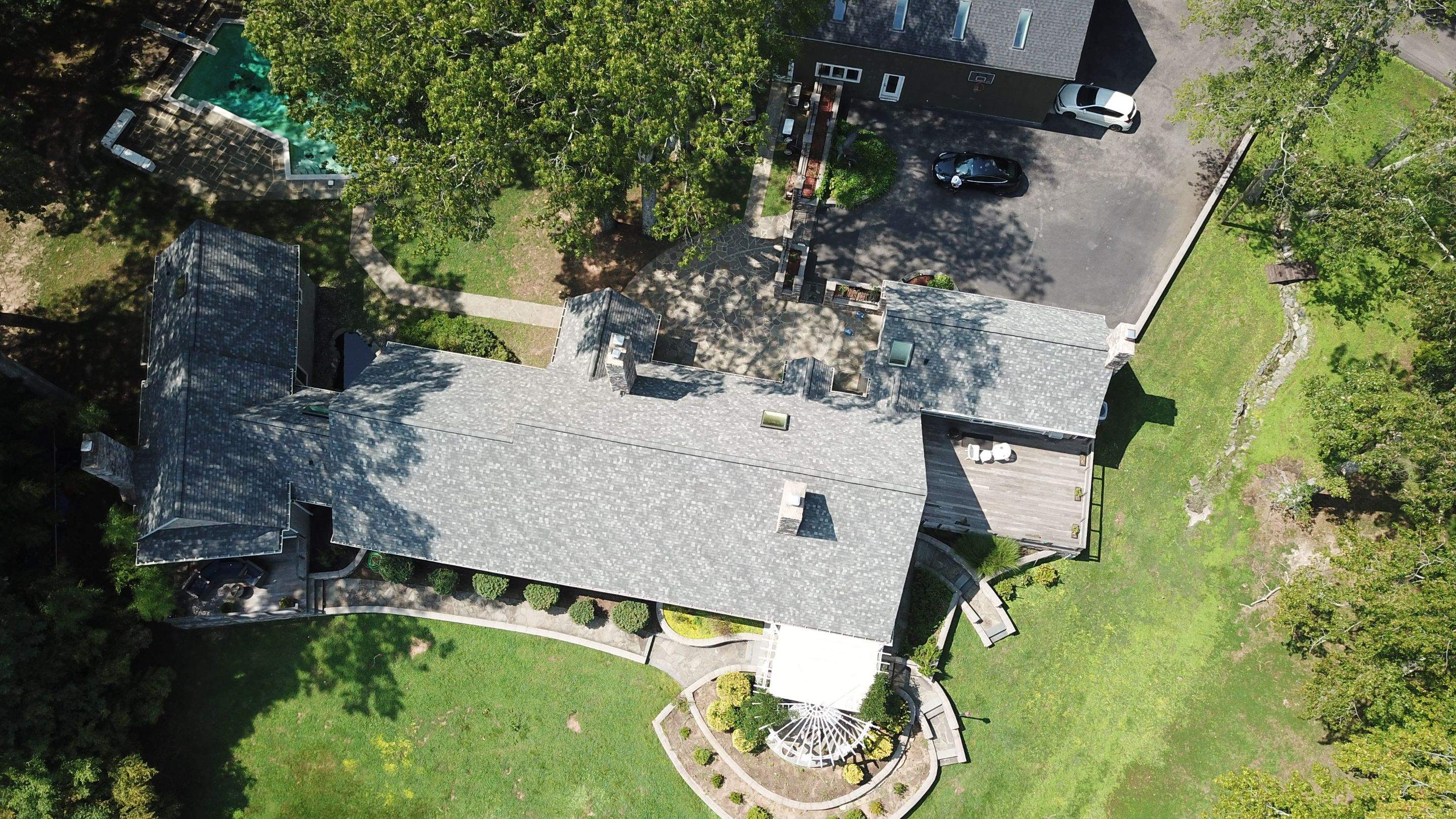 Roof Replacement using IKO Dynasty by American Home Contractors