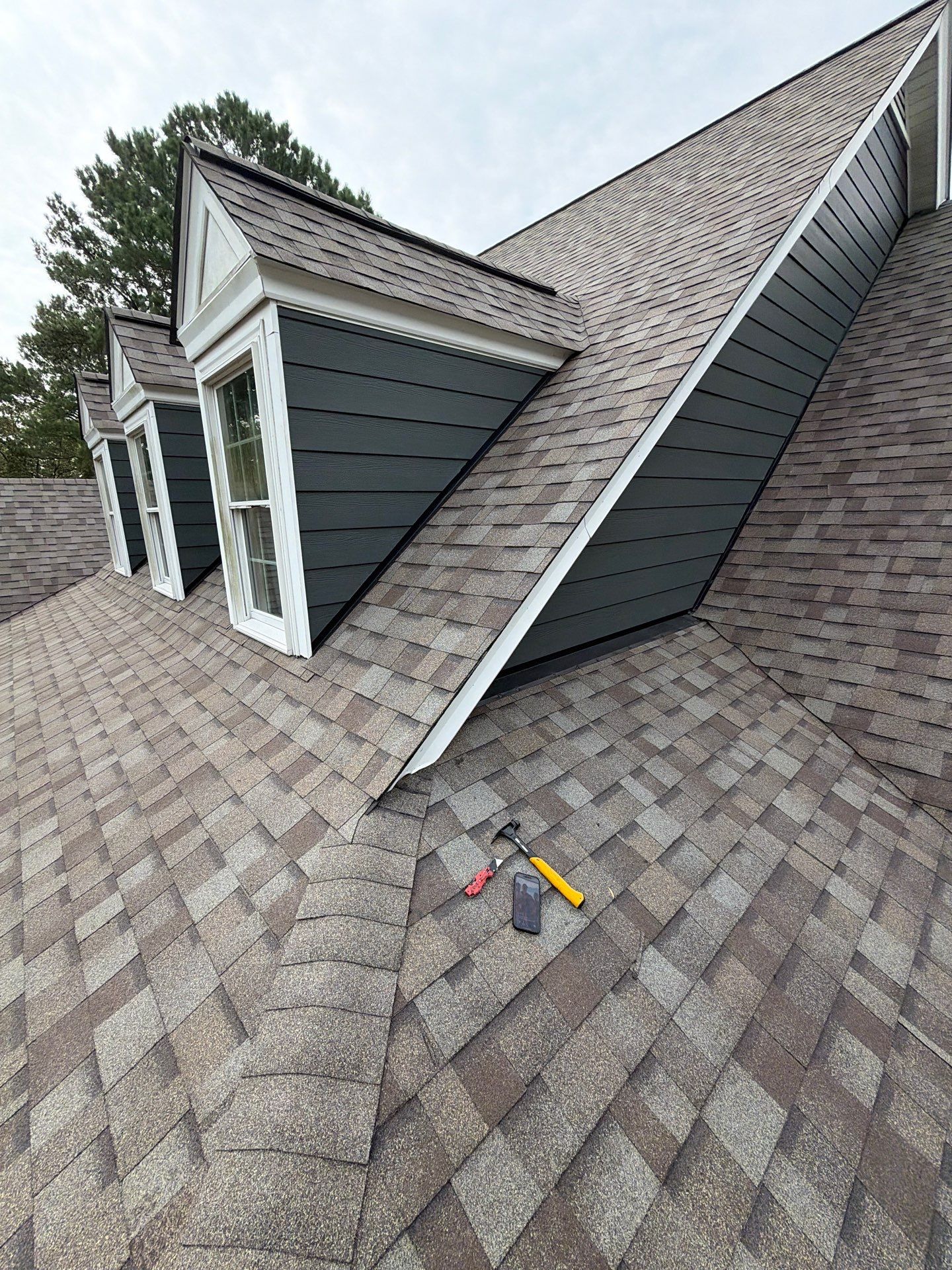 Roof Replacement and White Gutter Installation in Gloucester by Cade Construction