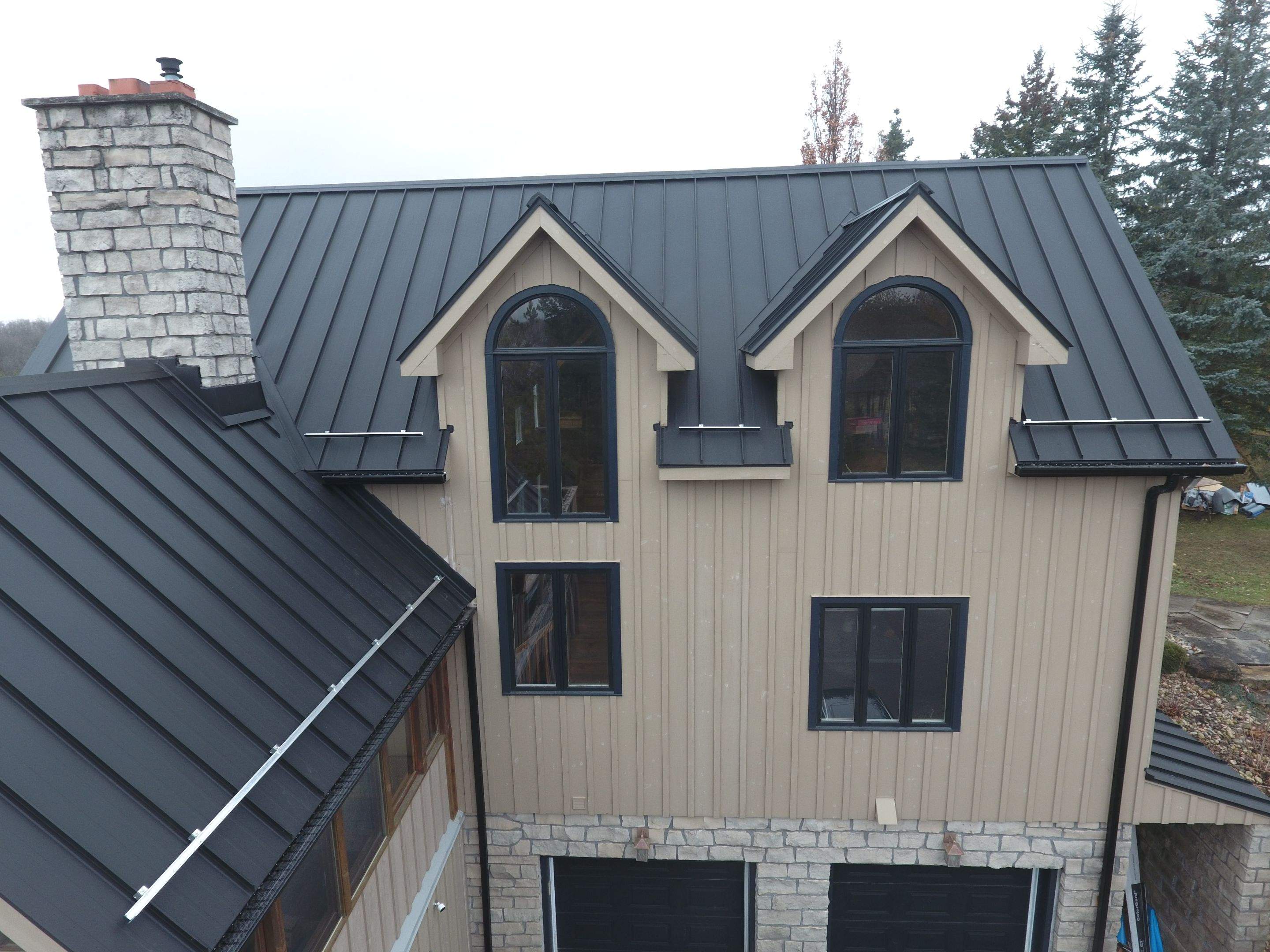 Residential Roofing Installation using 24 Ga Standing Seam Metal by Jay Carter Roofing & Sheet Metal